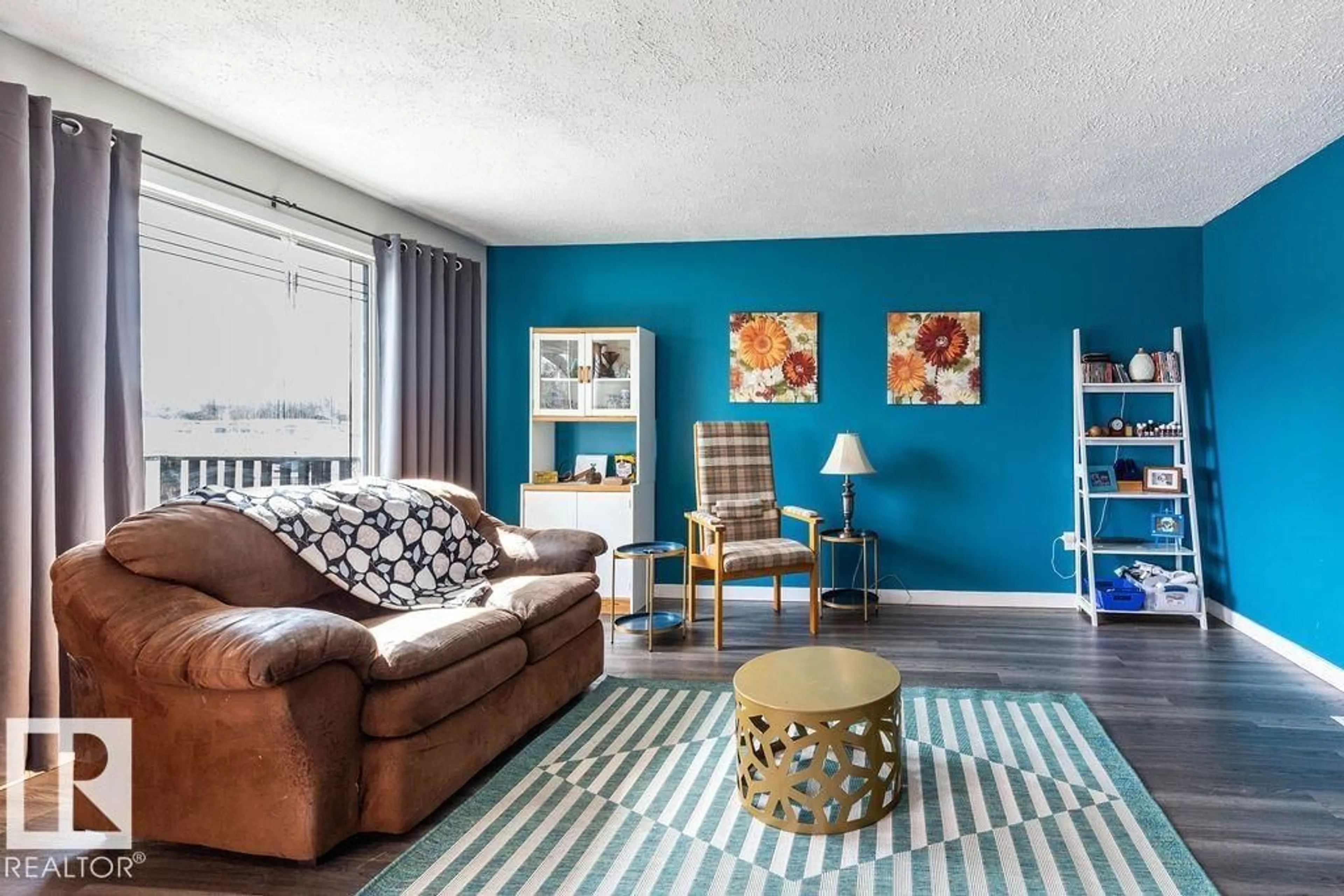 Living room with furniture, carpet floor for 4628 46 AVE, Evansburg Alberta T0E0T0