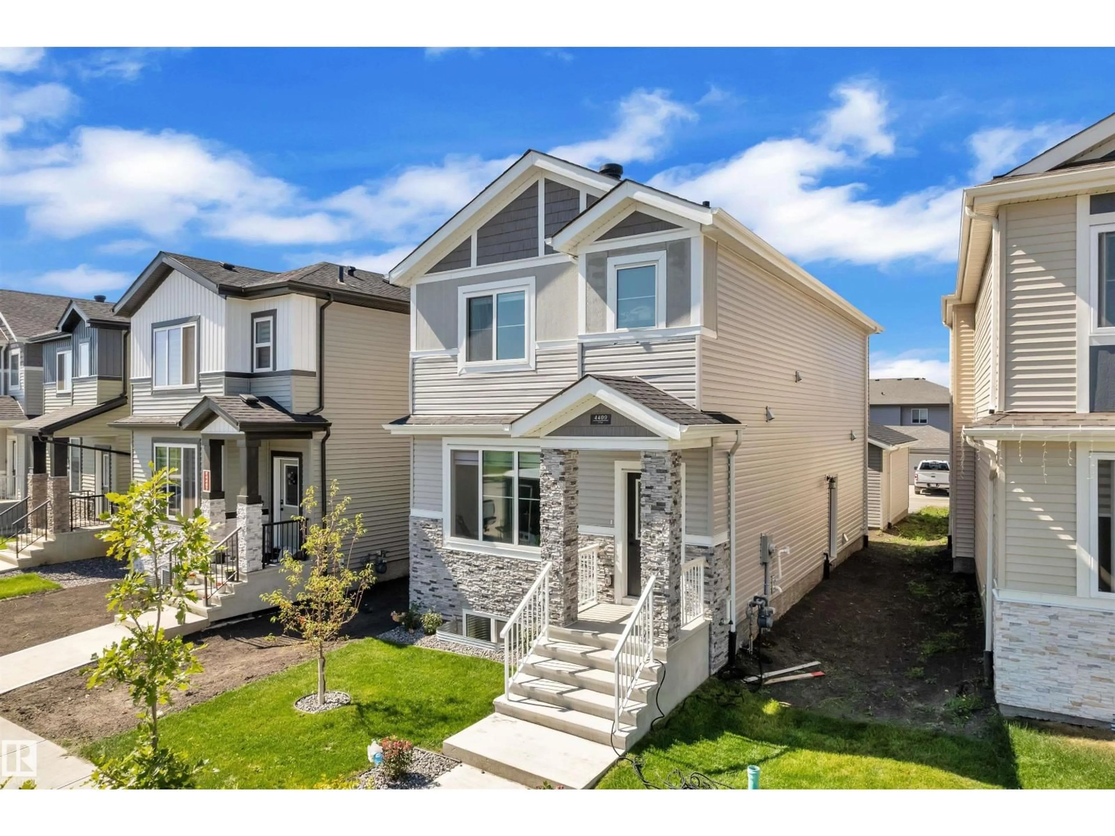 Home with vinyl exterior material, street for 4409 37 ST, Beaumont Alberta T4X3A7