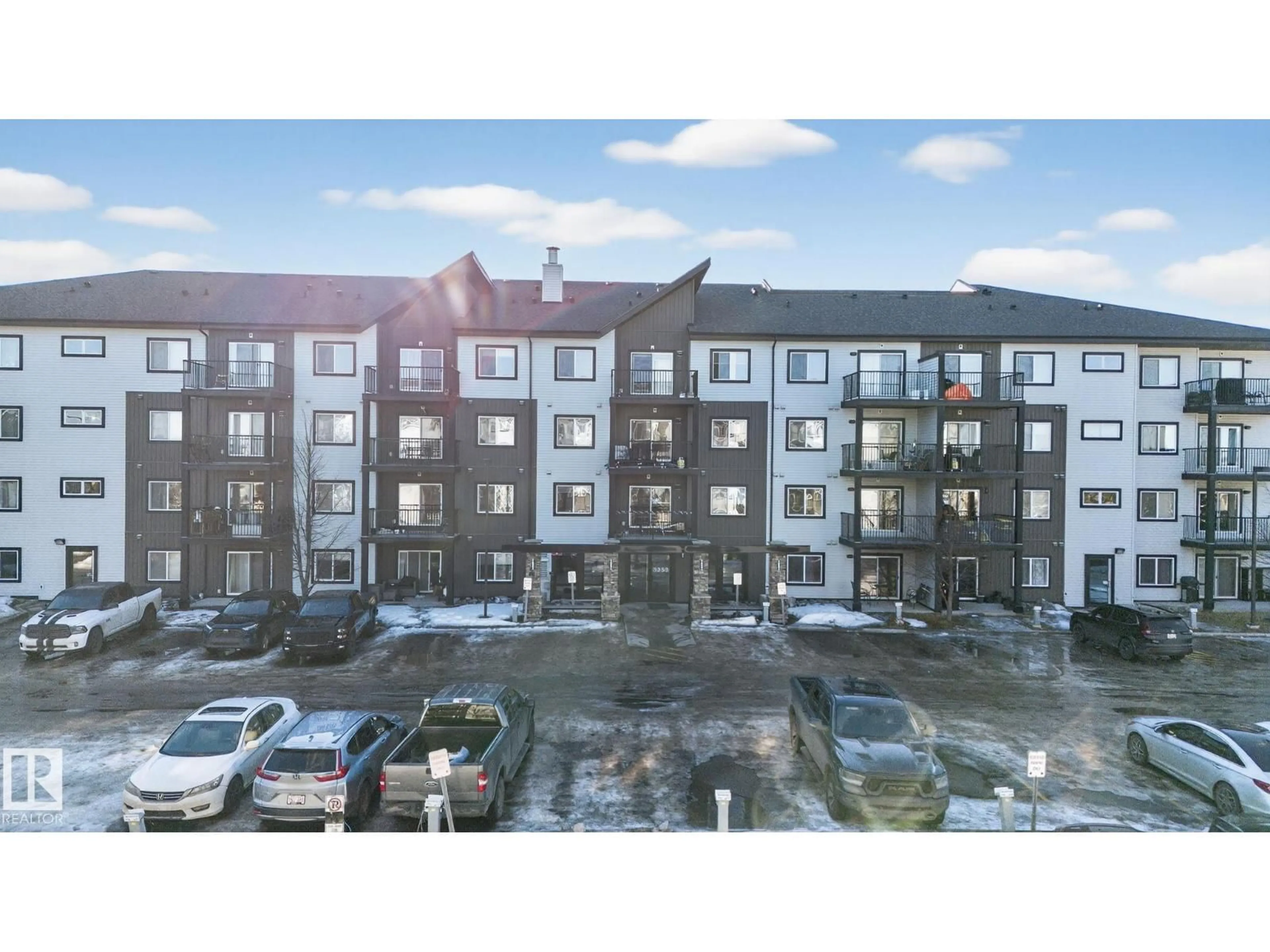 A pic from outside/outdoor area/front of a property/back of a property/a pic from drone, building for #406 - 3353 16A AV NW, Edmonton Alberta T6T0V4