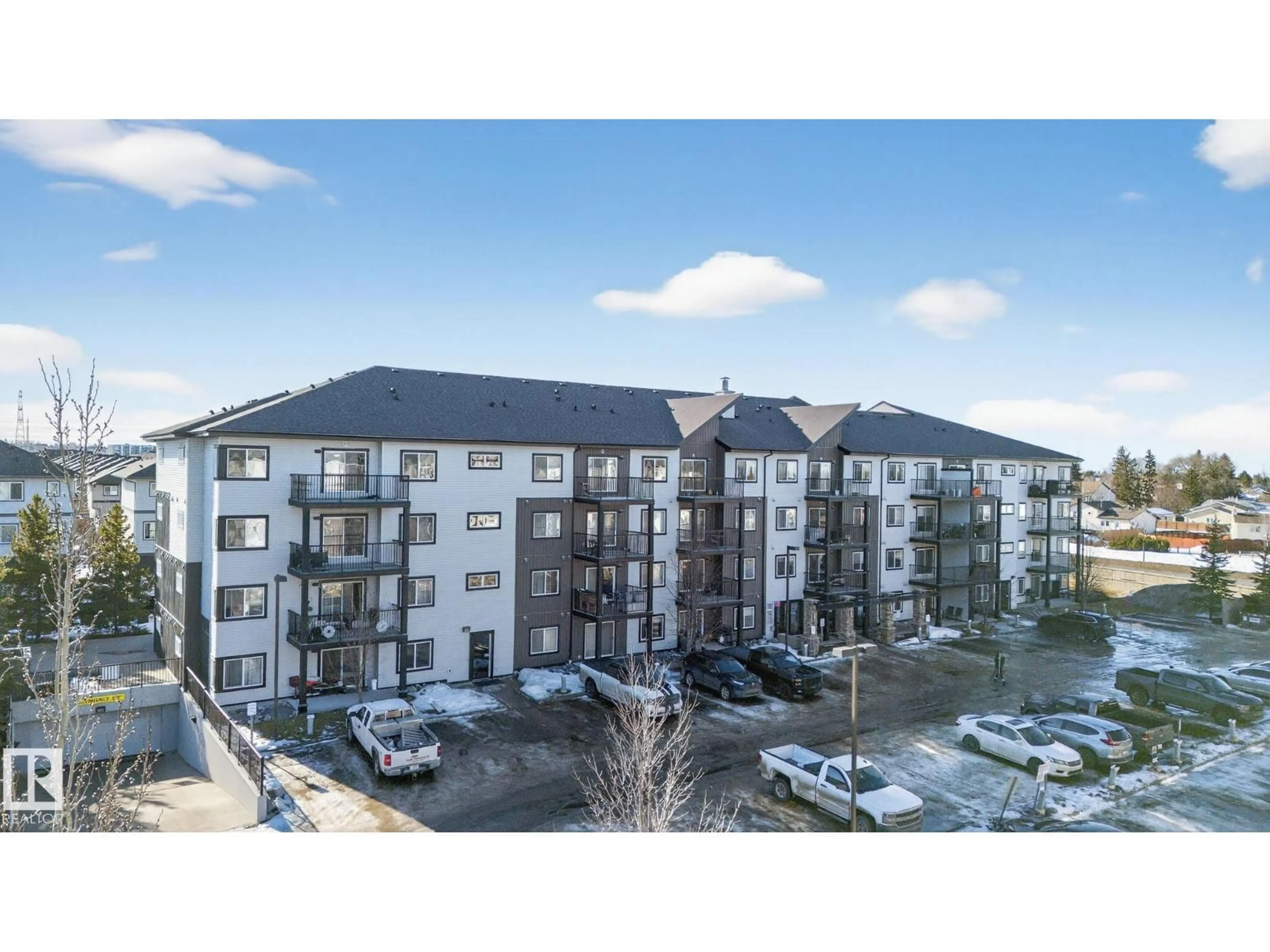 A pic from outside/outdoor area/front of a property/back of a property/a pic from drone, building for #406 - 3353 16A AV NW, Edmonton Alberta T6T0V4