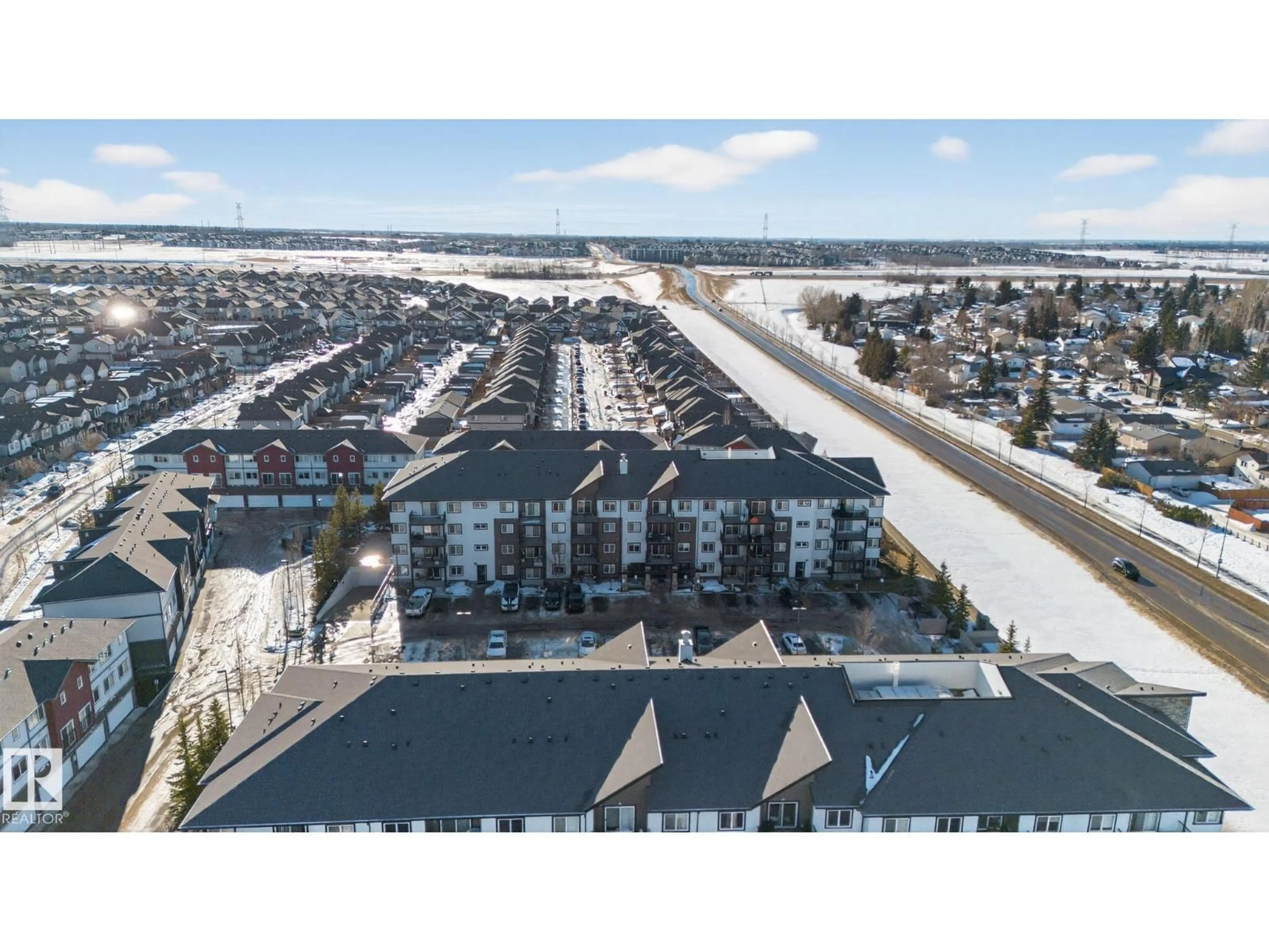 A pic from outside/outdoor area/front of a property/back of a property/a pic from drone, city buildings view from balcony for #406 - 3353 16A AV NW, Edmonton Alberta T6T0V4