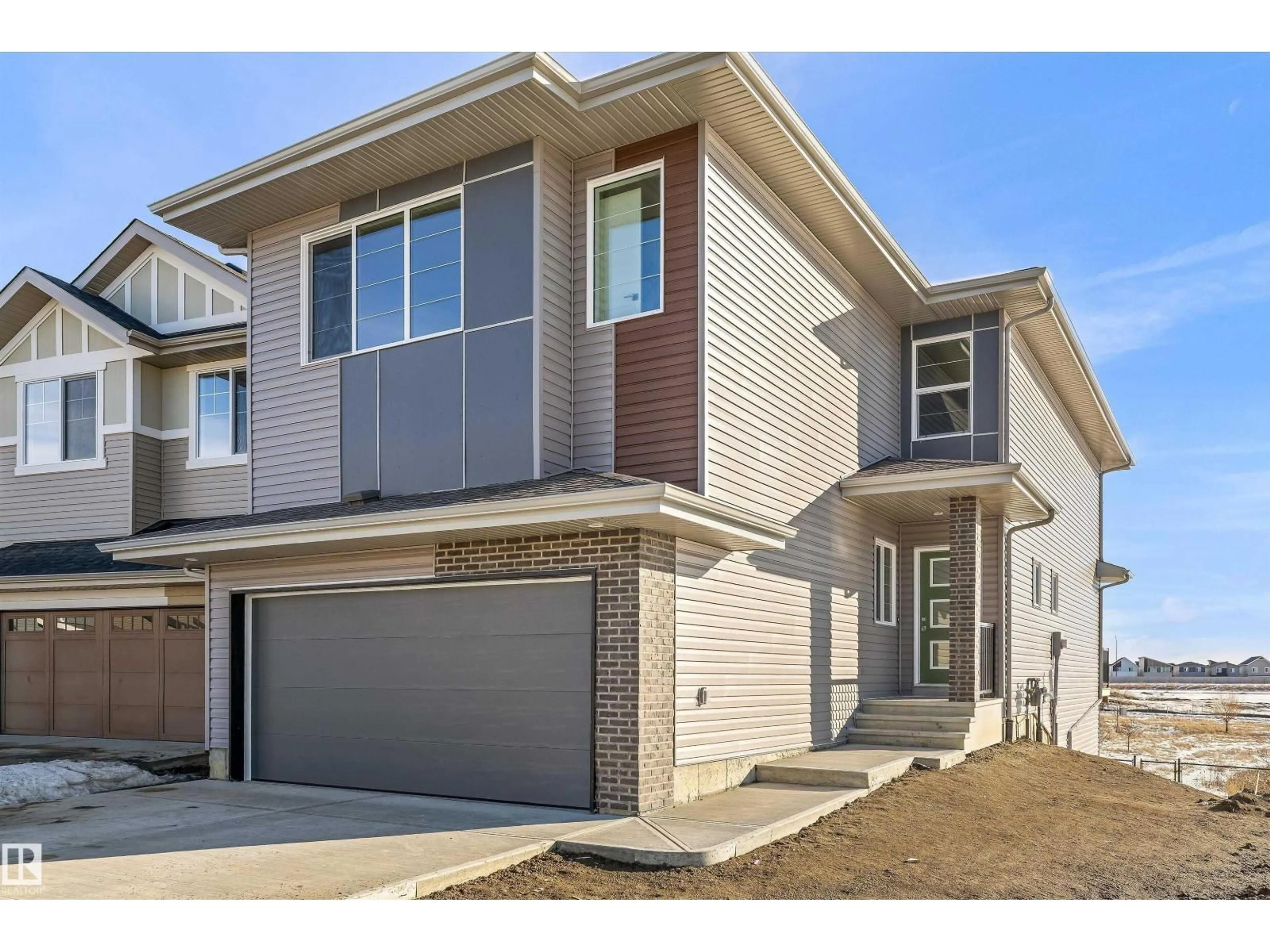 Home with brick exterior material, street for NW - 2804 191 ST, Edmonton Alberta T6M3C3