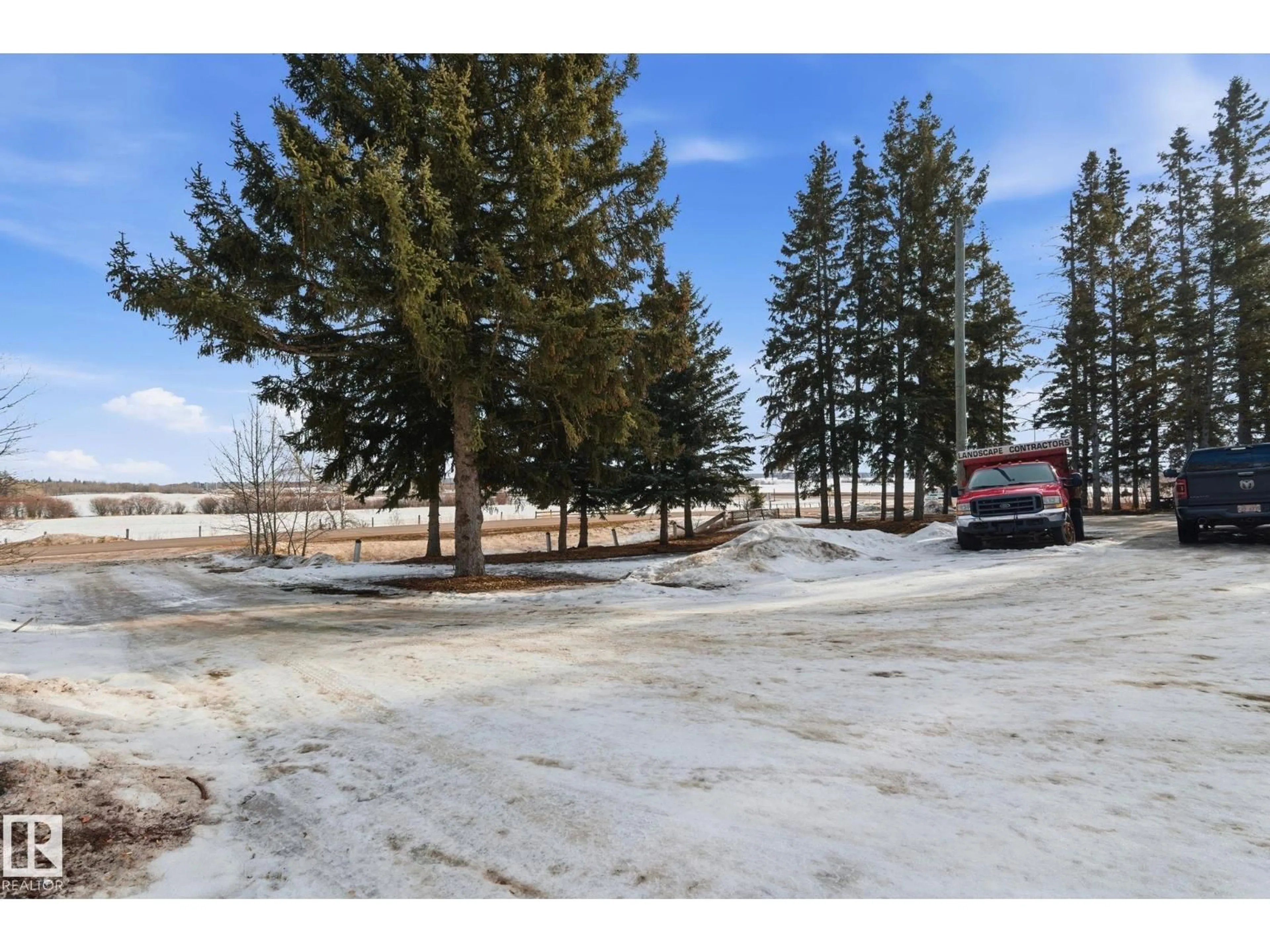 A pic from outside/outdoor area/front of a property/back of a property/a pic from drone, street for NE - 51548 RGE ROAD 232, Rural Strathcona County Alberta T8B1B1