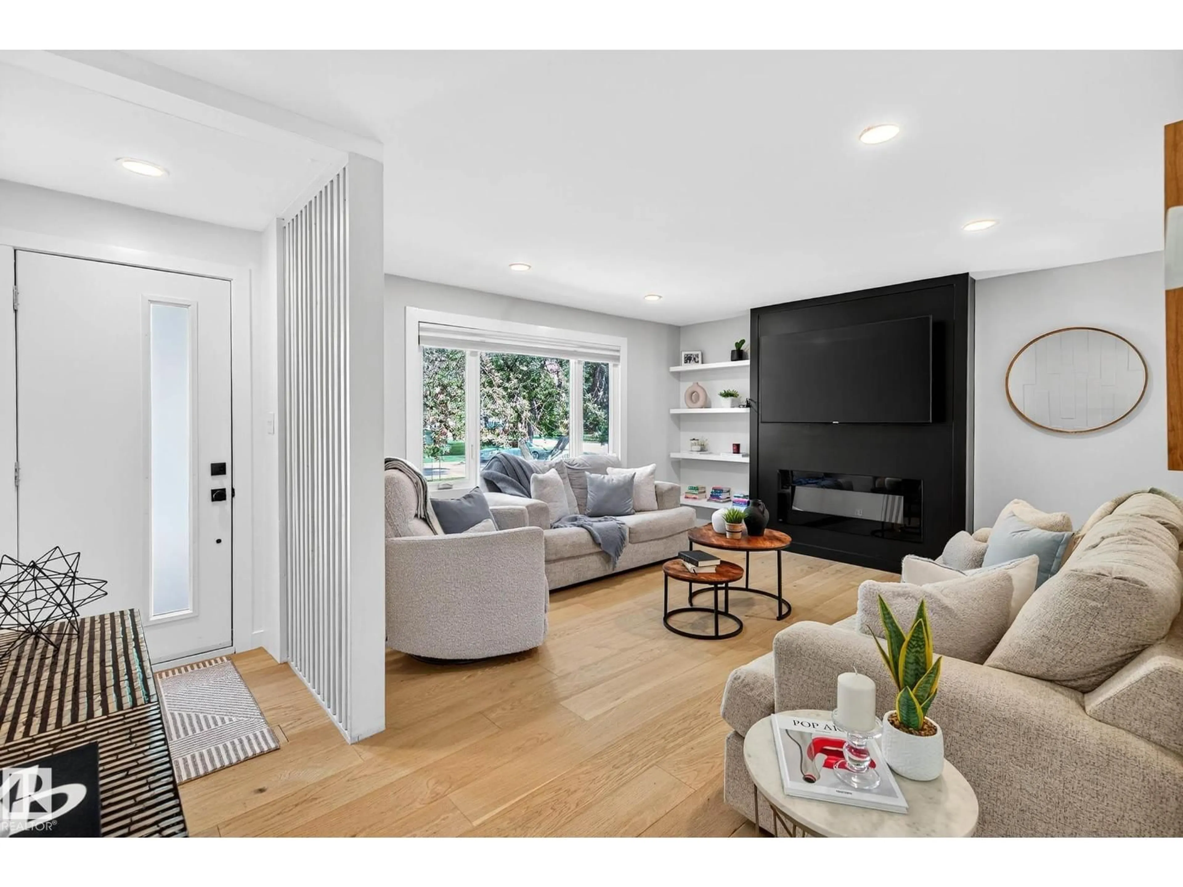 Living room with furniture, unknown for 10507 69 AV, Edmonton Alberta T6H2C5