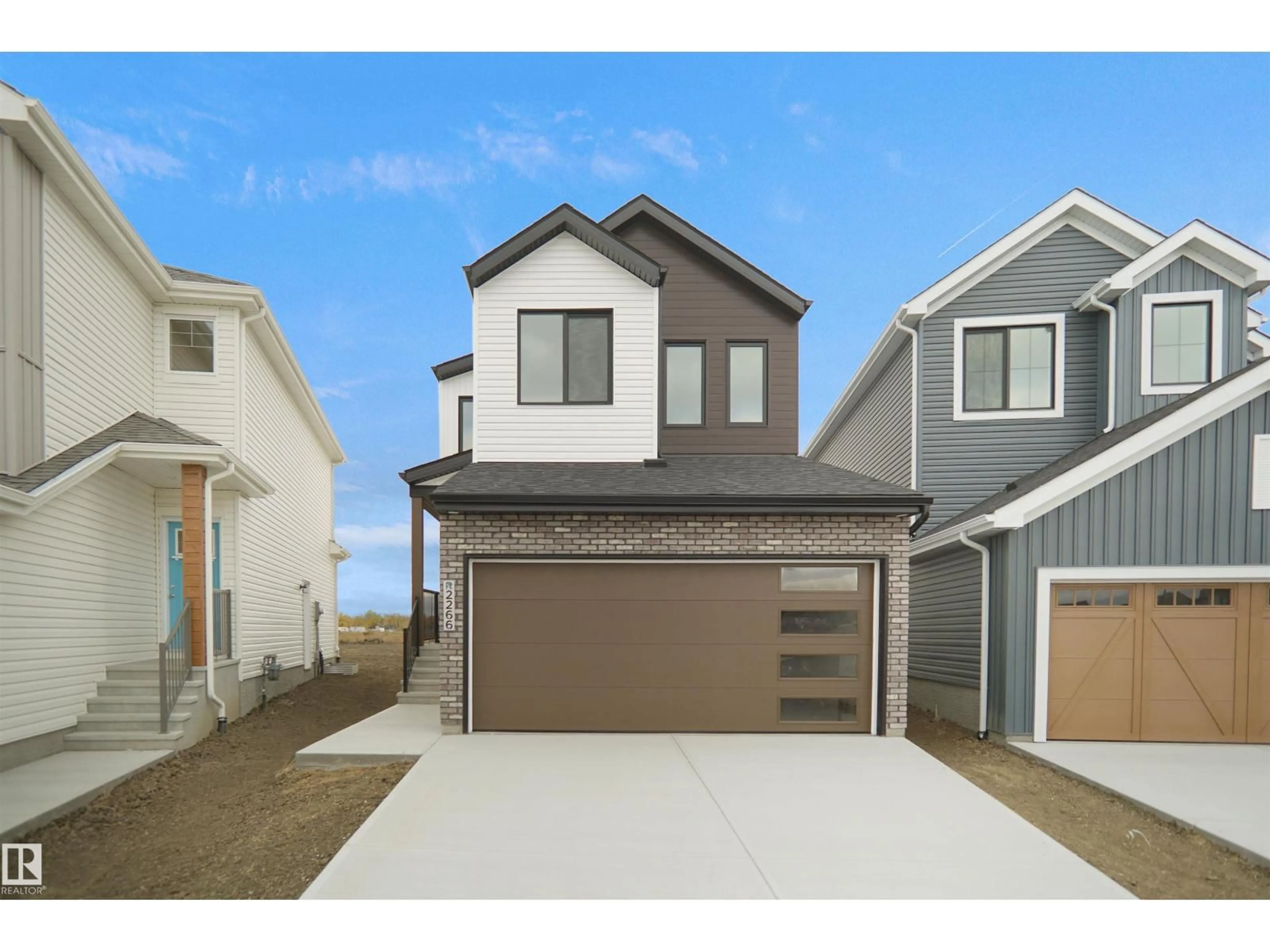 Home with vinyl exterior material, street for NW - 2266 194A ST, Edmonton Alberta T6M1P9