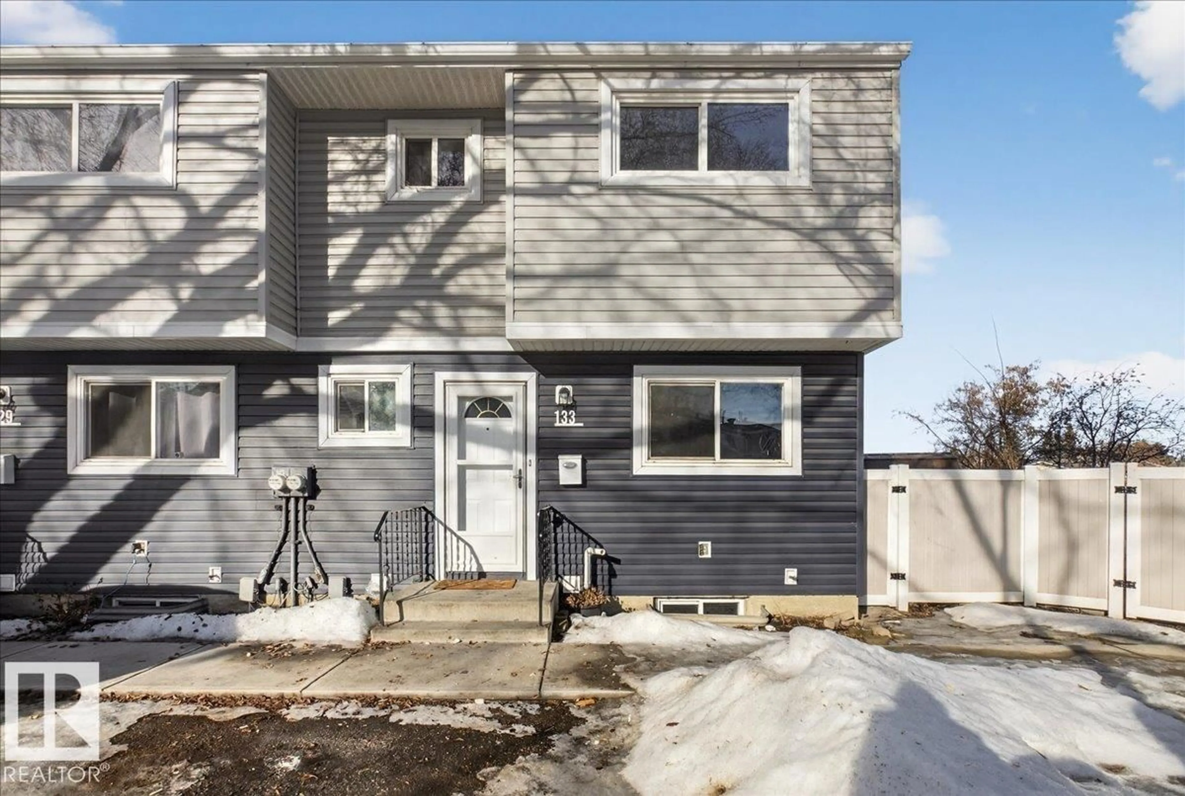 Home with vinyl exterior material, street for 133 HABITAT CR, Edmonton Alberta T5A3K8