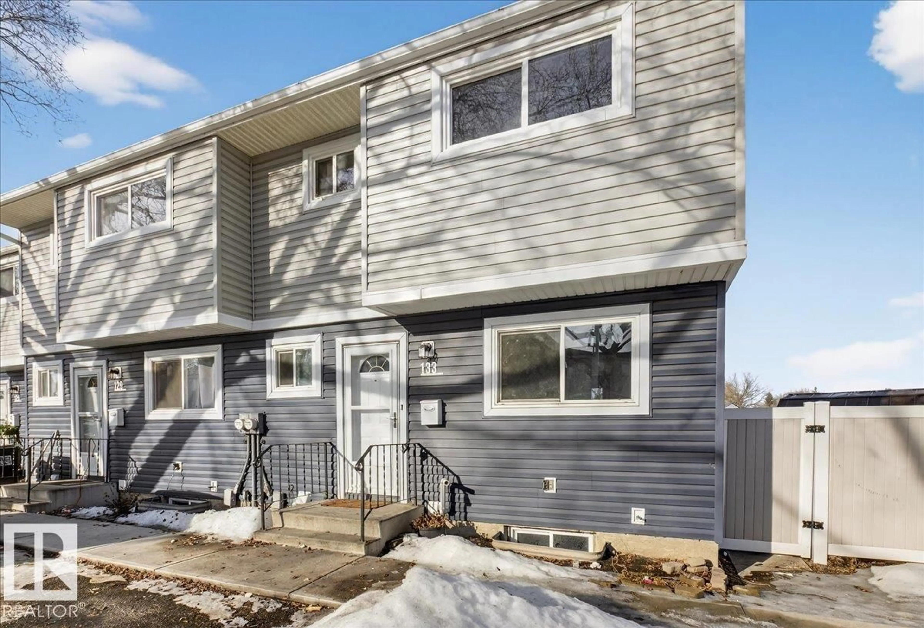 Home with vinyl exterior material, street for 133 HABITAT CR, Edmonton Alberta T5A3K8
