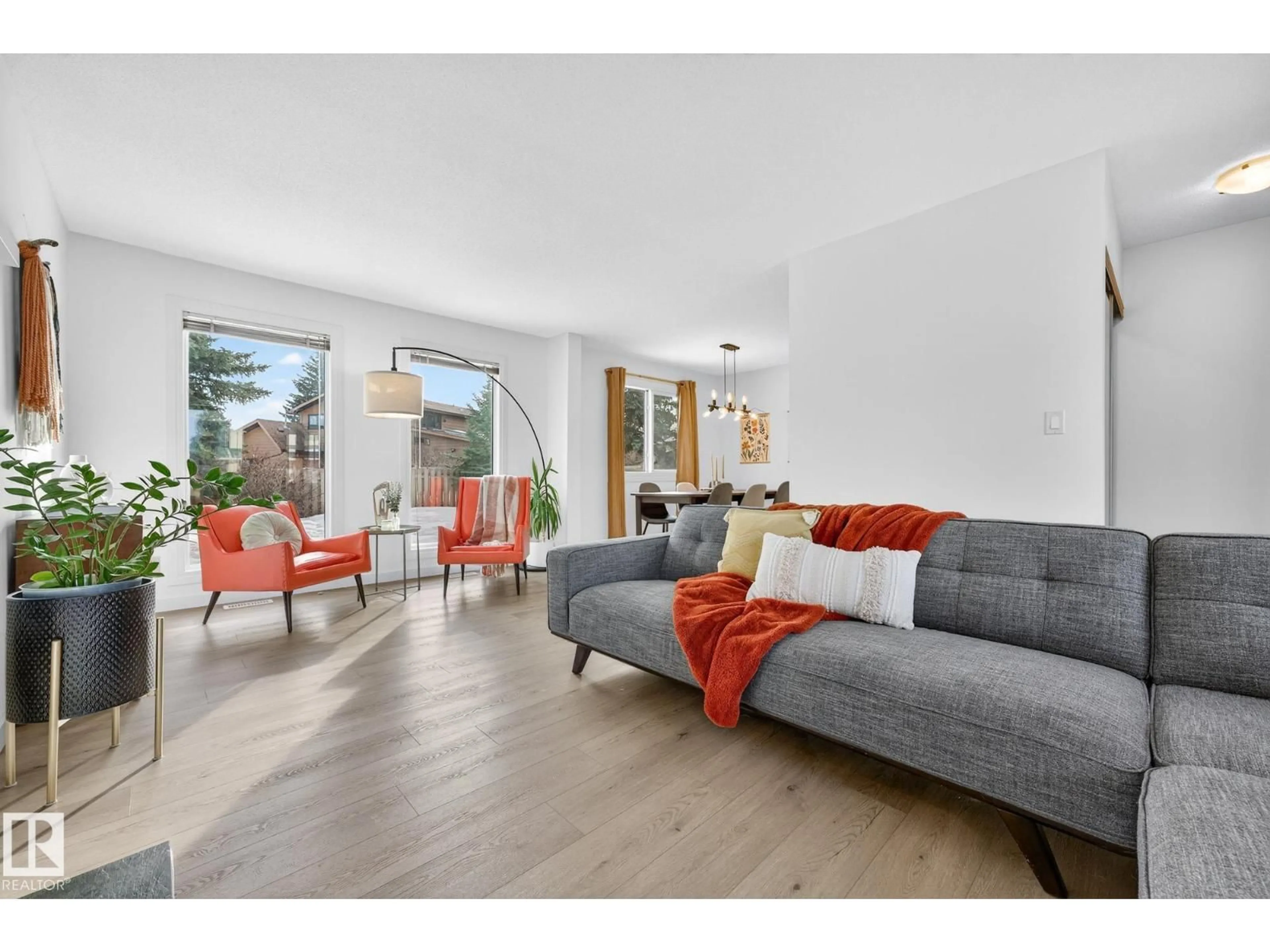 Living room with furniture, unknown for 10523 17 AV, Edmonton Alberta T6J5C2