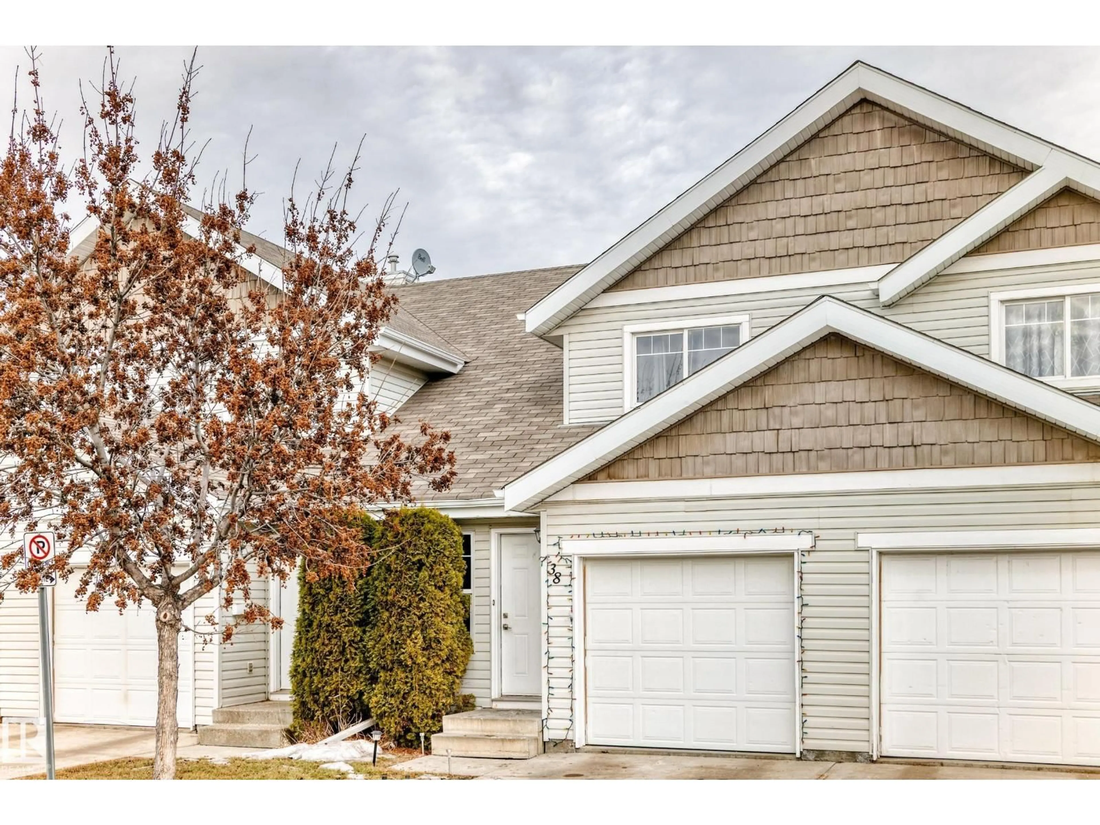 Home with vinyl exterior material, street for 38-150 EDWARDS DR, Edmonton Alberta T6X1M4