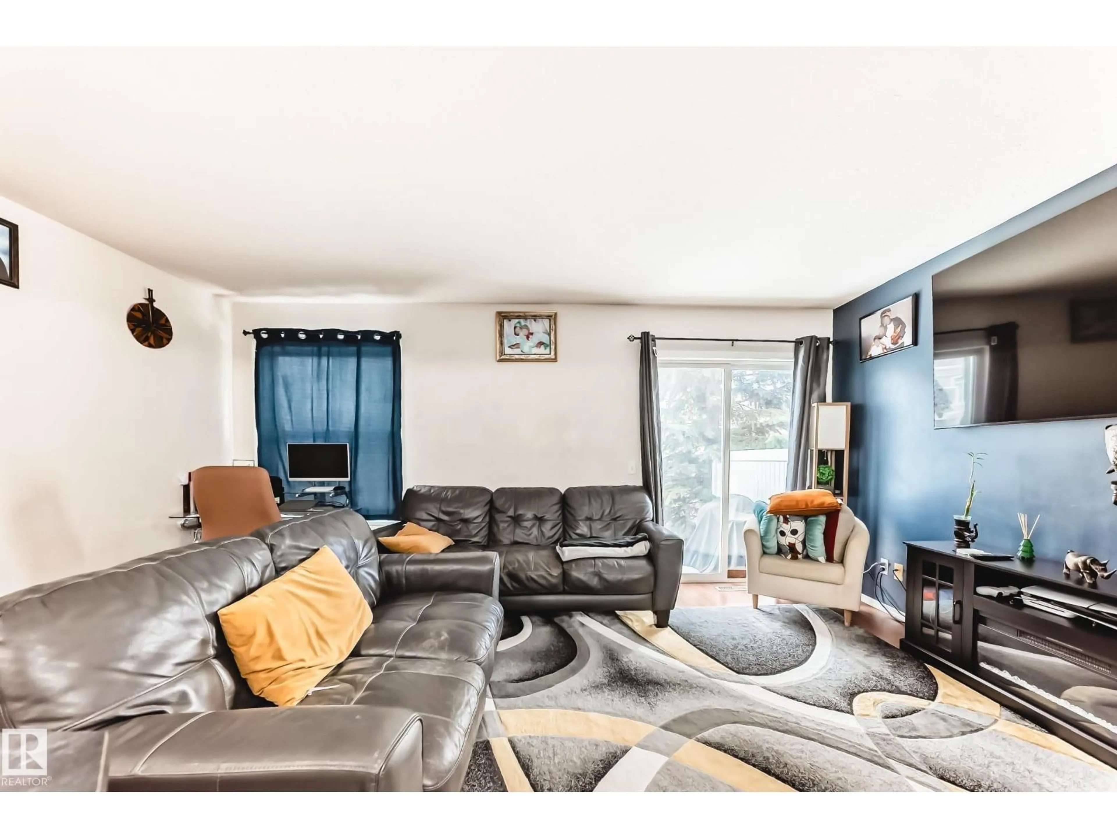 Living room with furniture, unknown for 38-150 EDWARDS DR, Edmonton Alberta T6X1M4