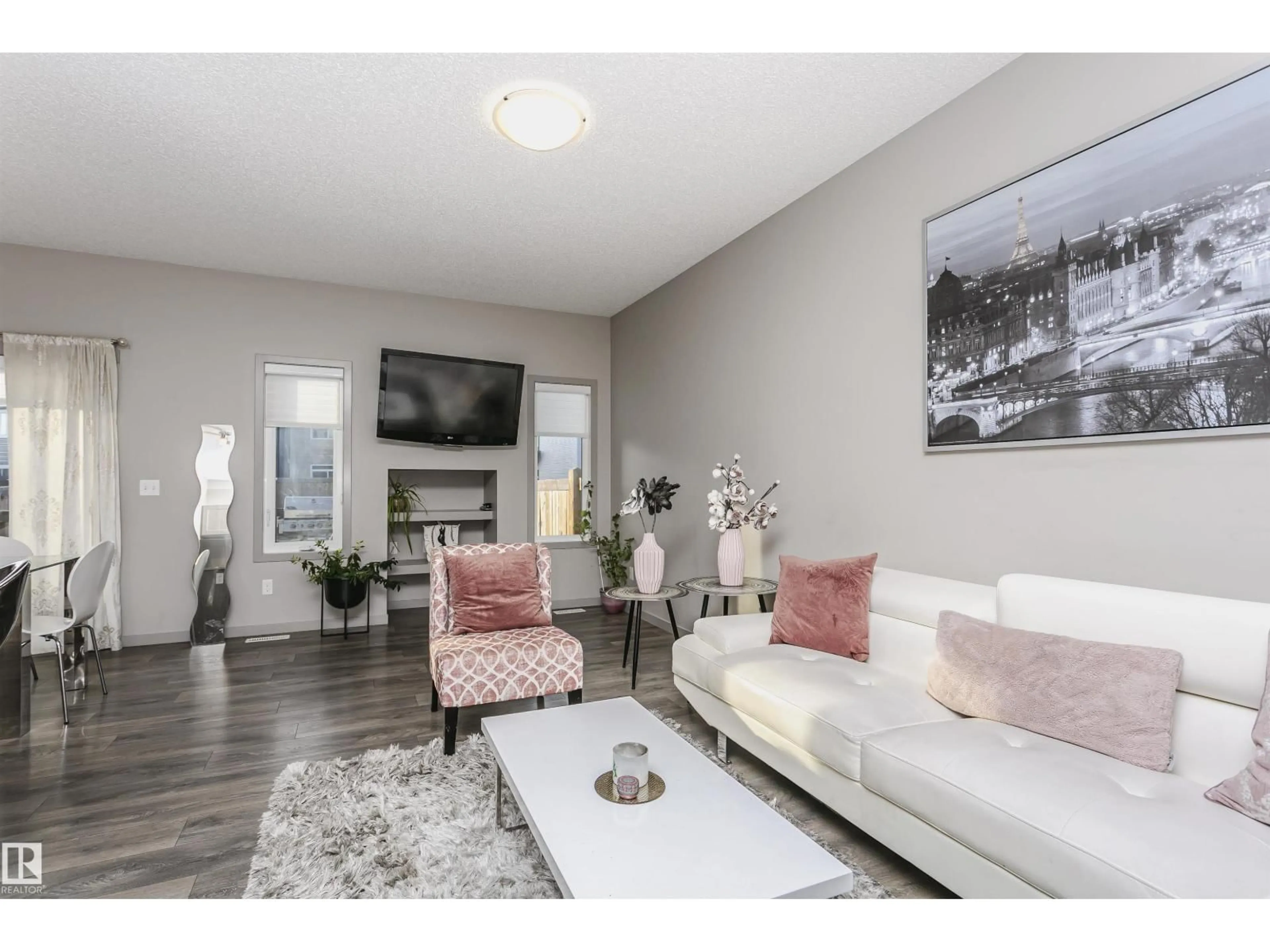 Living room with furniture, unknown for 2855 16 AV, Edmonton Alberta T6T0Z6