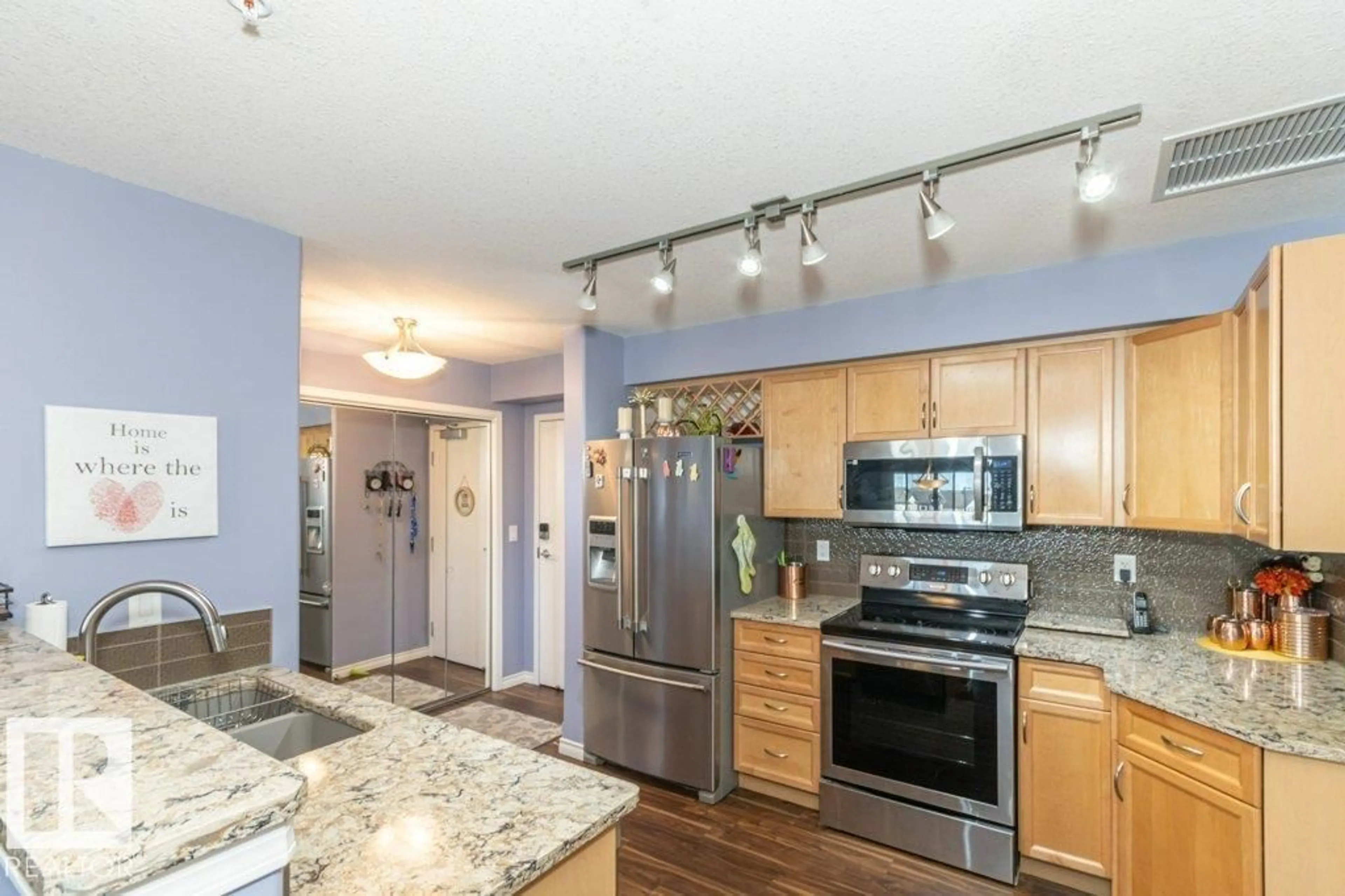 Open concept kitchen, unknown for #306 - 1589 GLASTONBURY BV, Edmonton Alberta T5T2V1