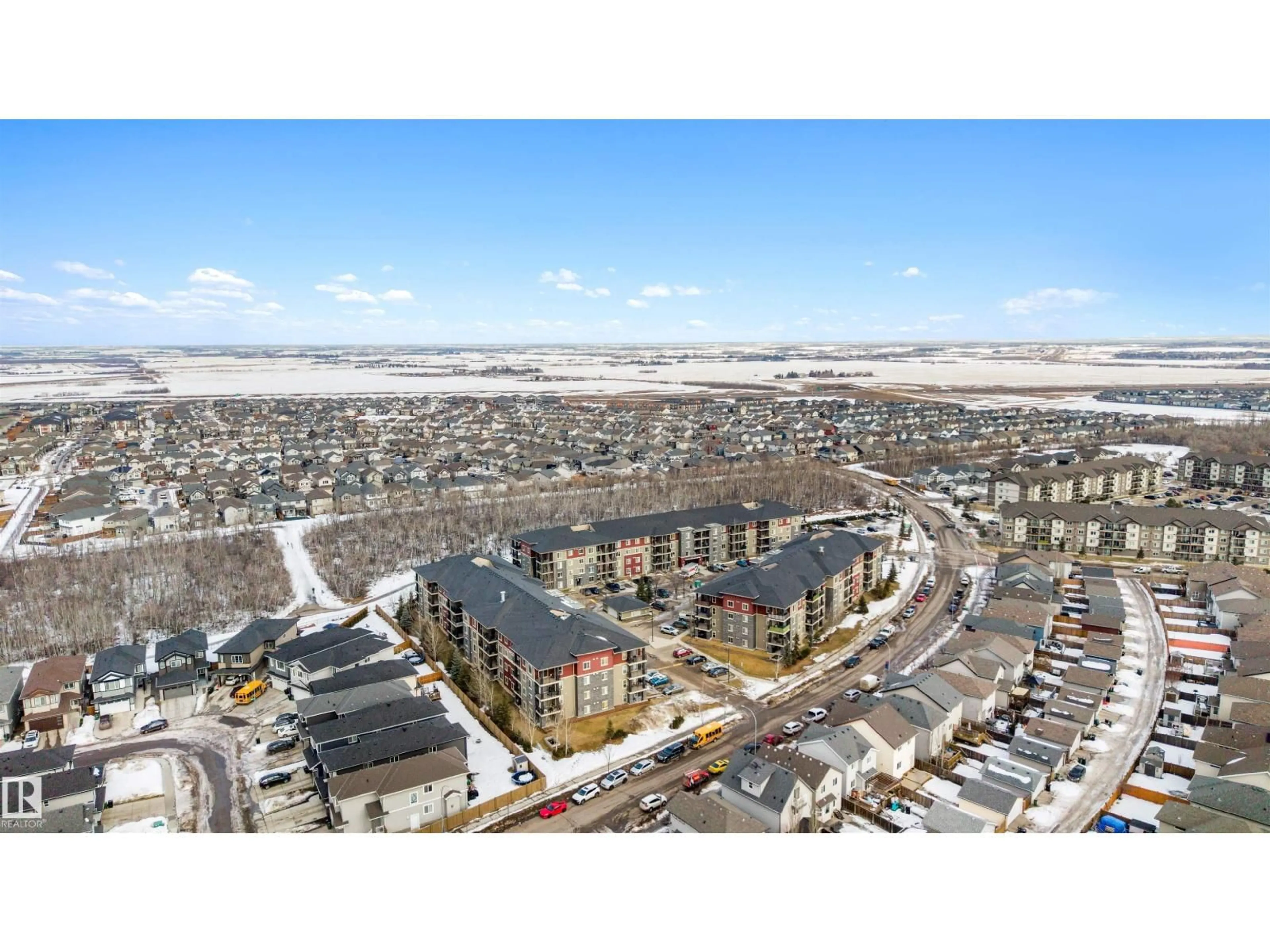 A pic from outside/outdoor area/front of a property/back of a property/a pic from drone, unknown for 303 - 1080 MCCONACHIE BV, Edmonton Alberta T5Y0X2