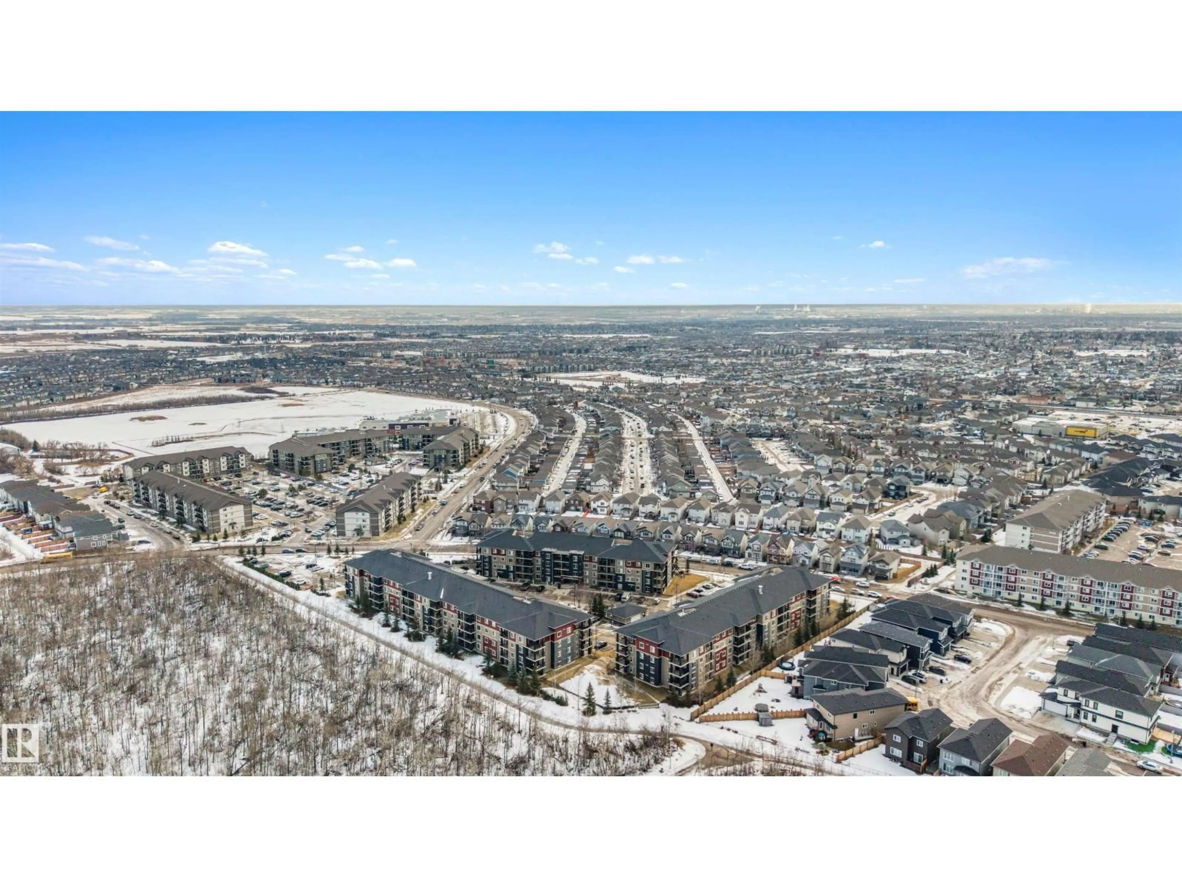A pic from outside/outdoor area/front of a property/back of a property/a pic from drone, unknown for 303 - 1080 MCCONACHIE BV, Edmonton Alberta T5Y0X2