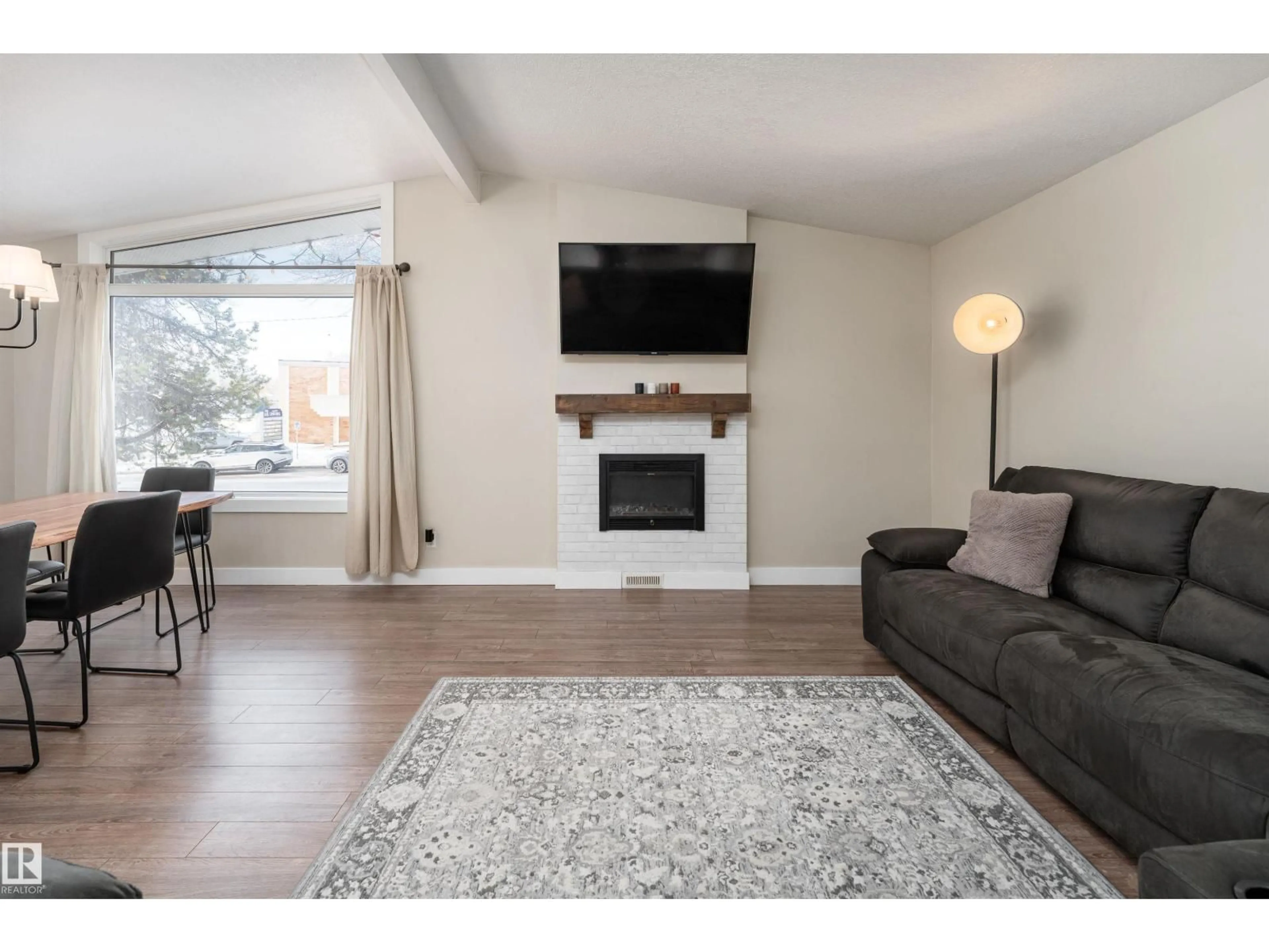 Living room with furniture, wood/laminate floor for 73 GROSVENOR BV, St. Albert Alberta T8N0X8