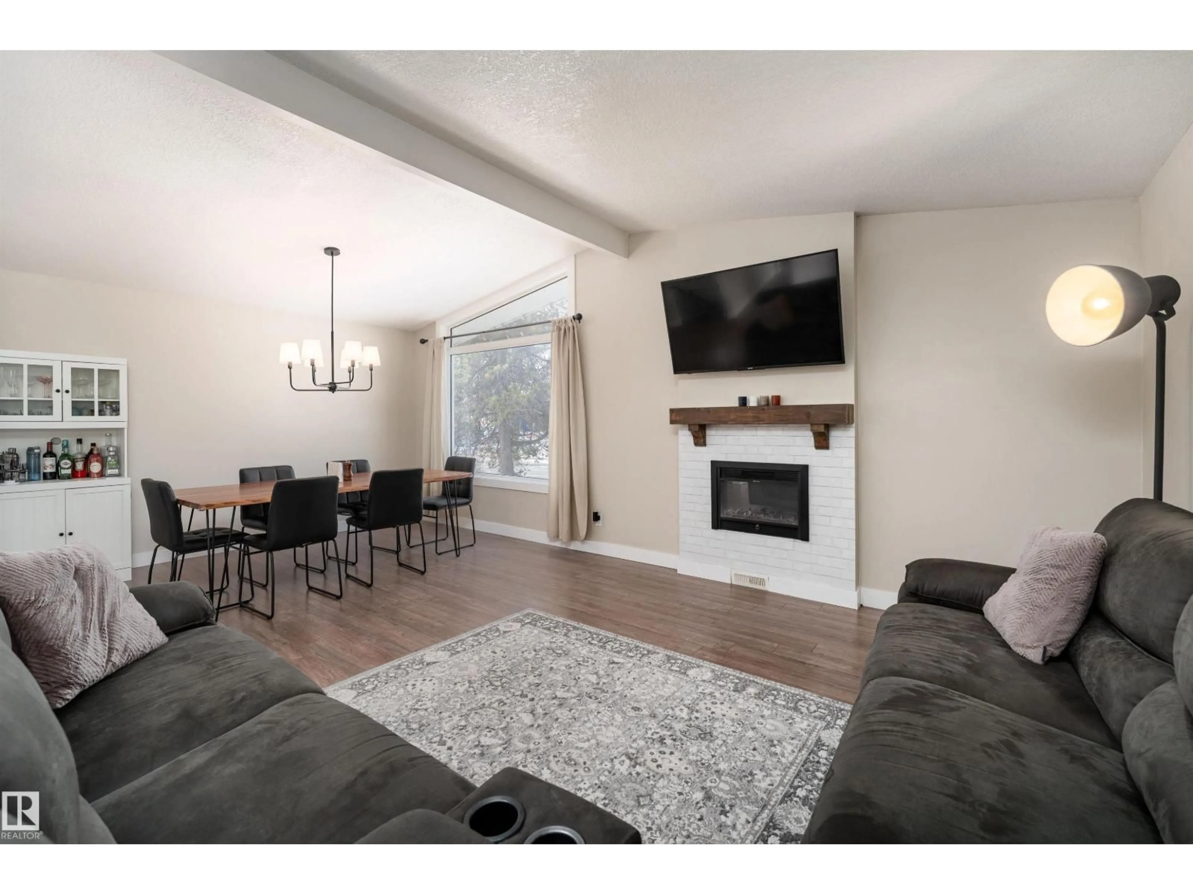 Living room with furniture, wood/laminate floor for 73 GROSVENOR BV, St. Albert Alberta T8N0X8