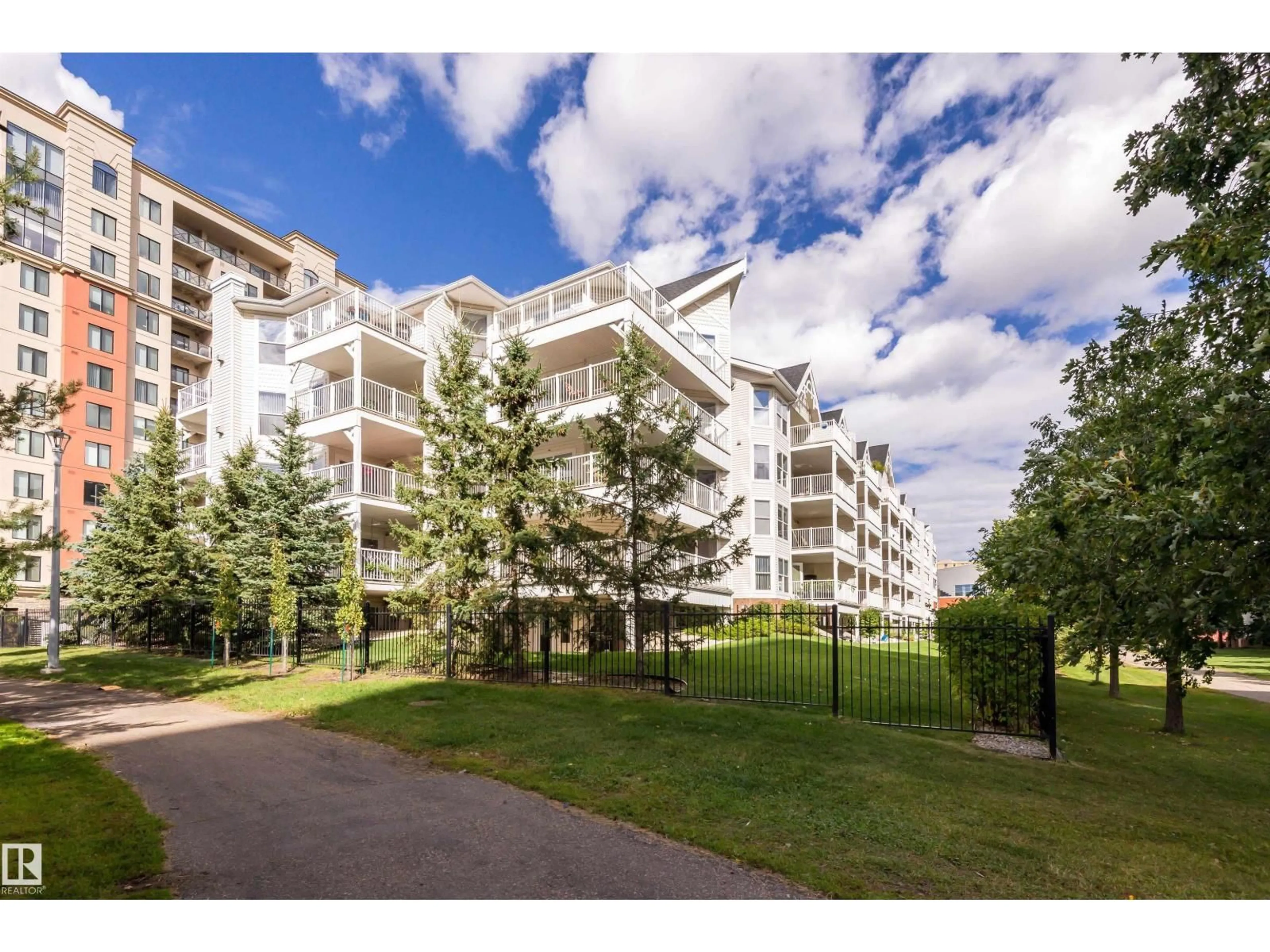 A pic from outside/outdoor area/front of a property/back of a property/a pic from drone, unknown for 307 - 10311 111 ST NW, Edmonton Alberta T5K2Y8