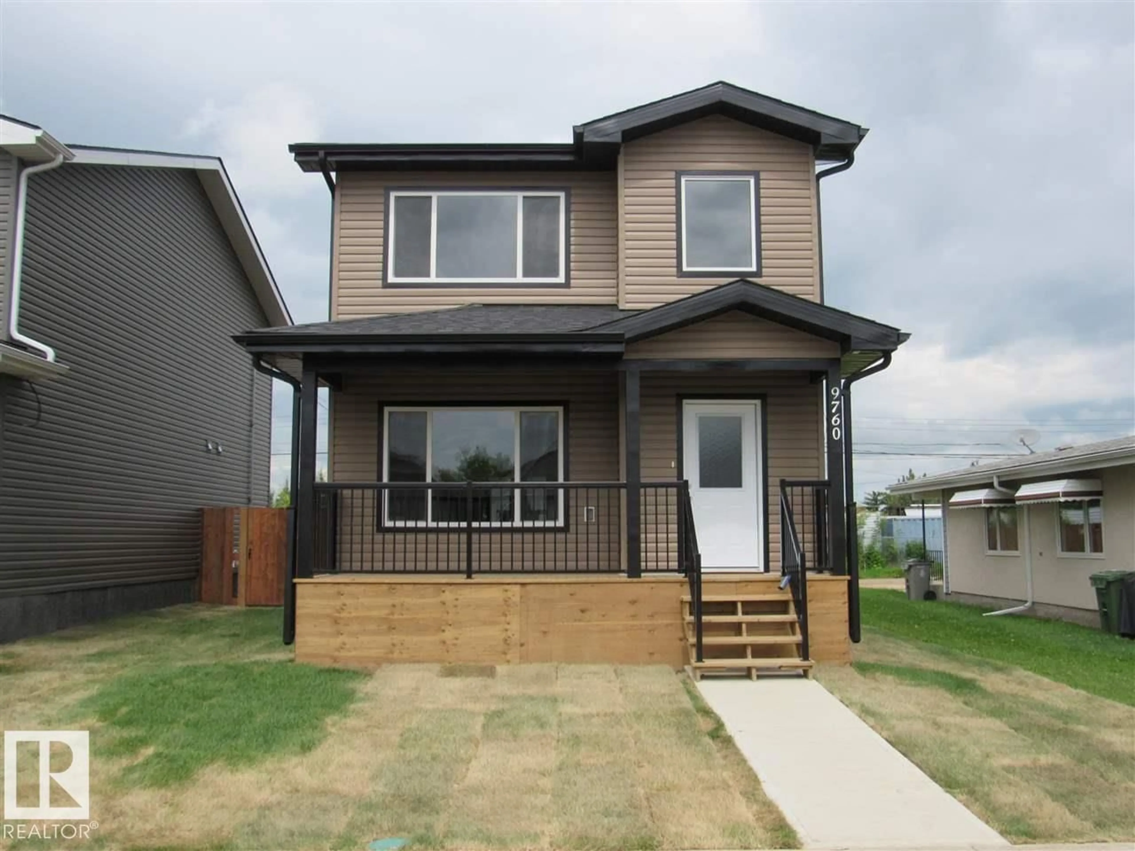 Home with vinyl exterior material, street for 9760 107 STREET, Westlock Alberta T7P1R5
