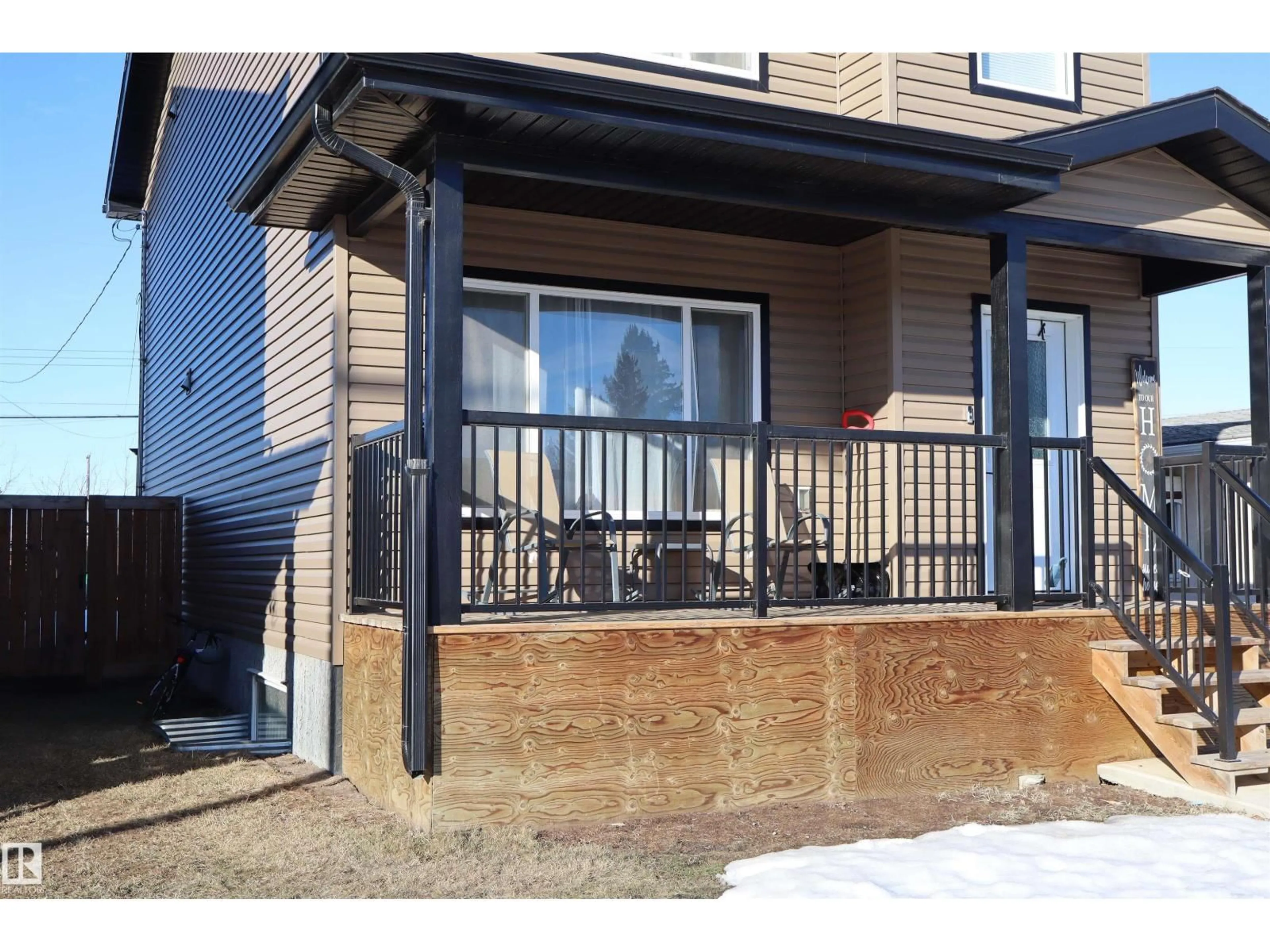 Home with vinyl exterior material, street for 9760 107 STREET, Westlock Alberta T7P1R5