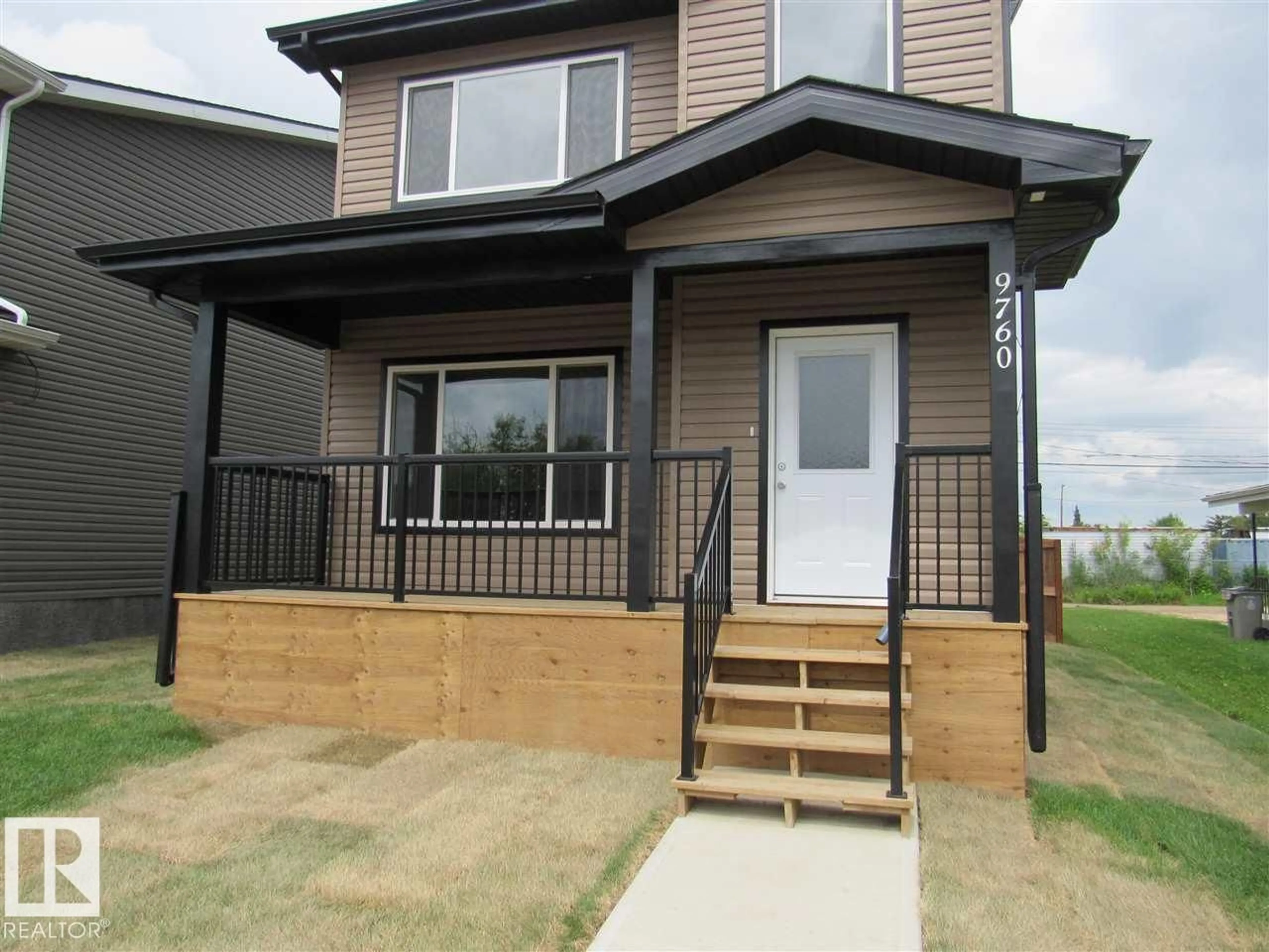 Home with vinyl exterior material, street for 9760 107 STREET, Westlock Alberta T7P1R5