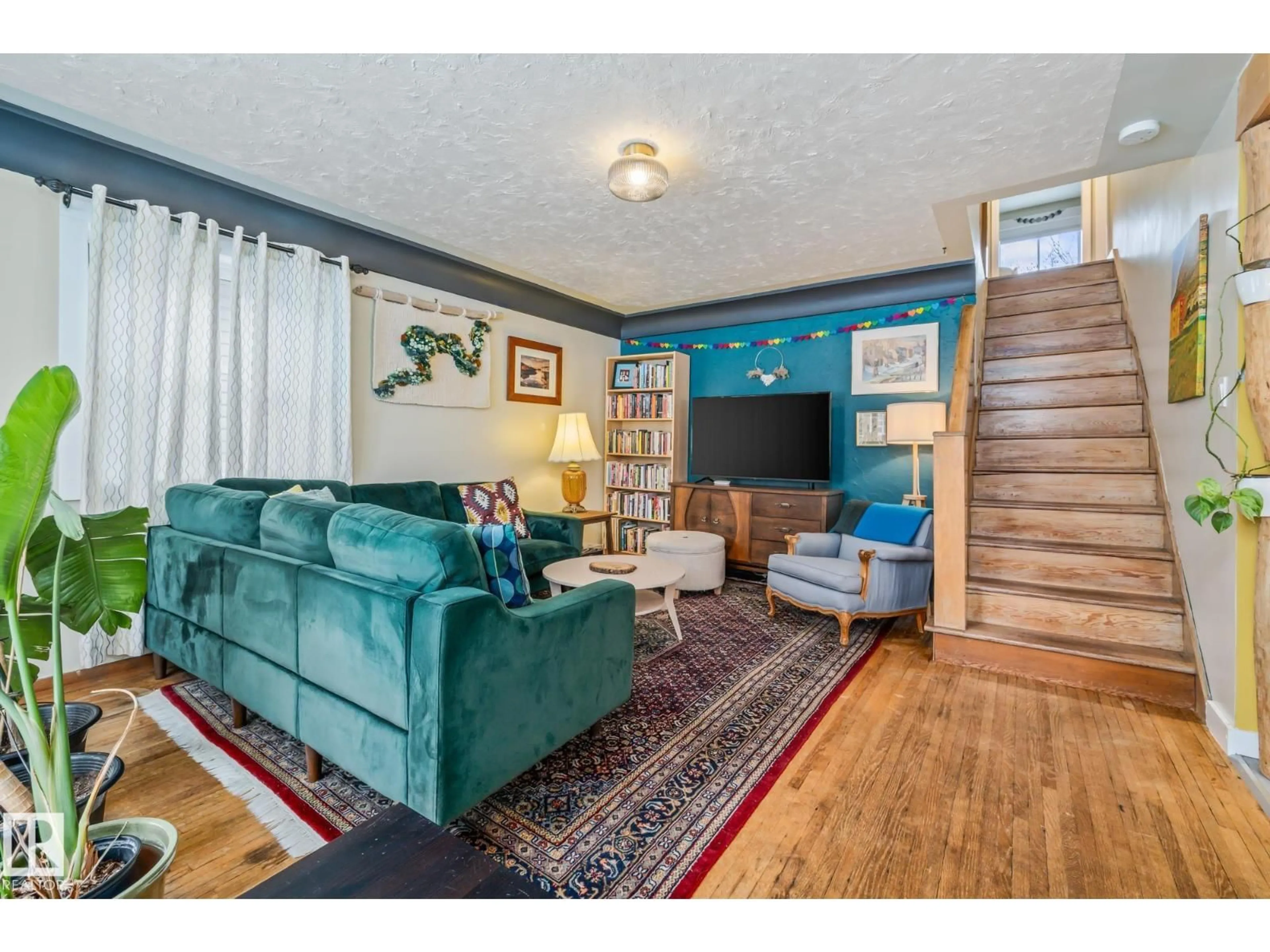 Living room with furniture, unknown for NW - 11427 68 ST, Edmonton Alberta T5B1N9