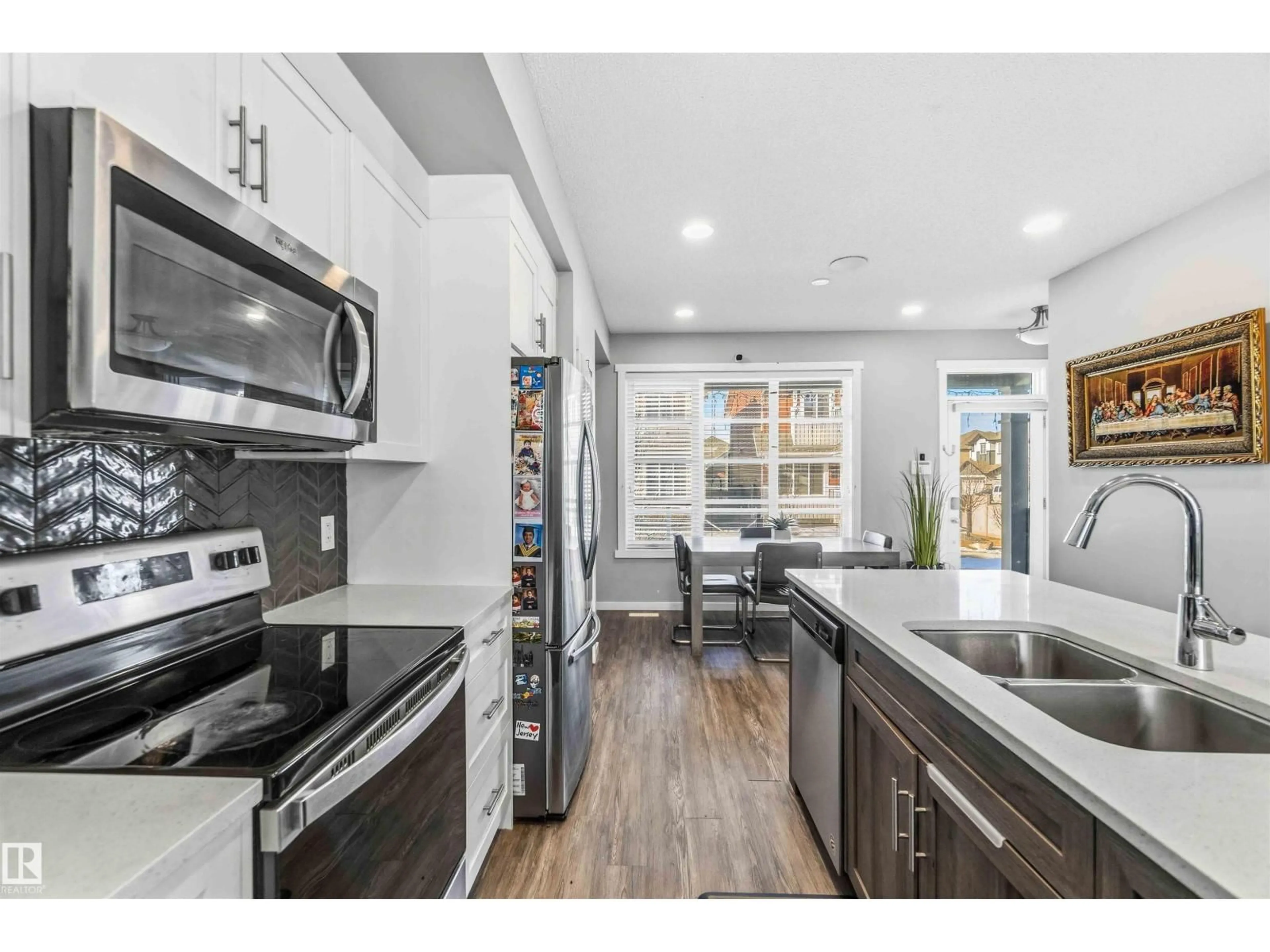 Open concept kitchen, unknown for NW - 1908 25 ST, Edmonton Alberta T6T2H7