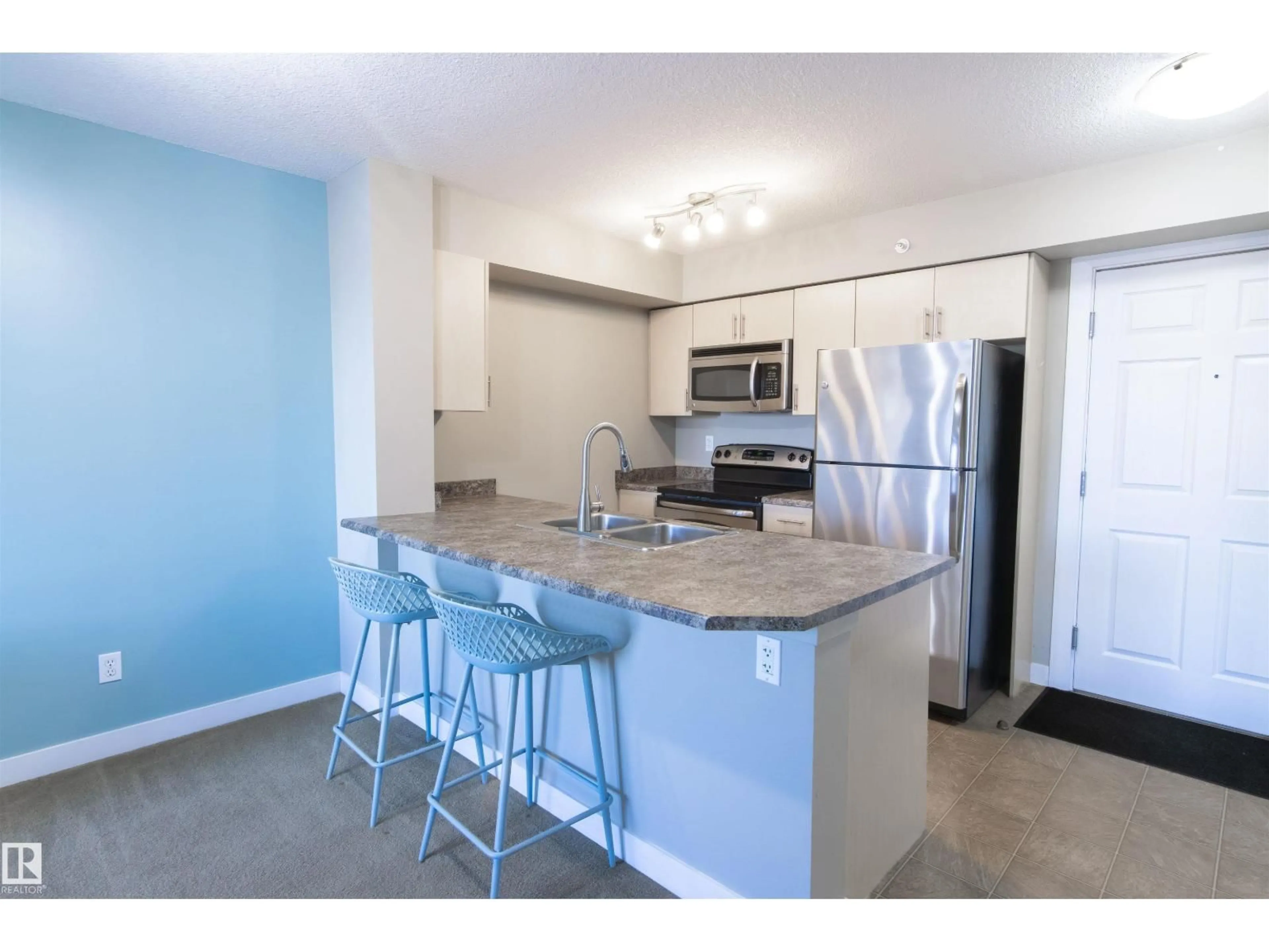Open concept kitchen, unknown for 411 - 920 156 ST, Edmonton Alberta T6R0N6