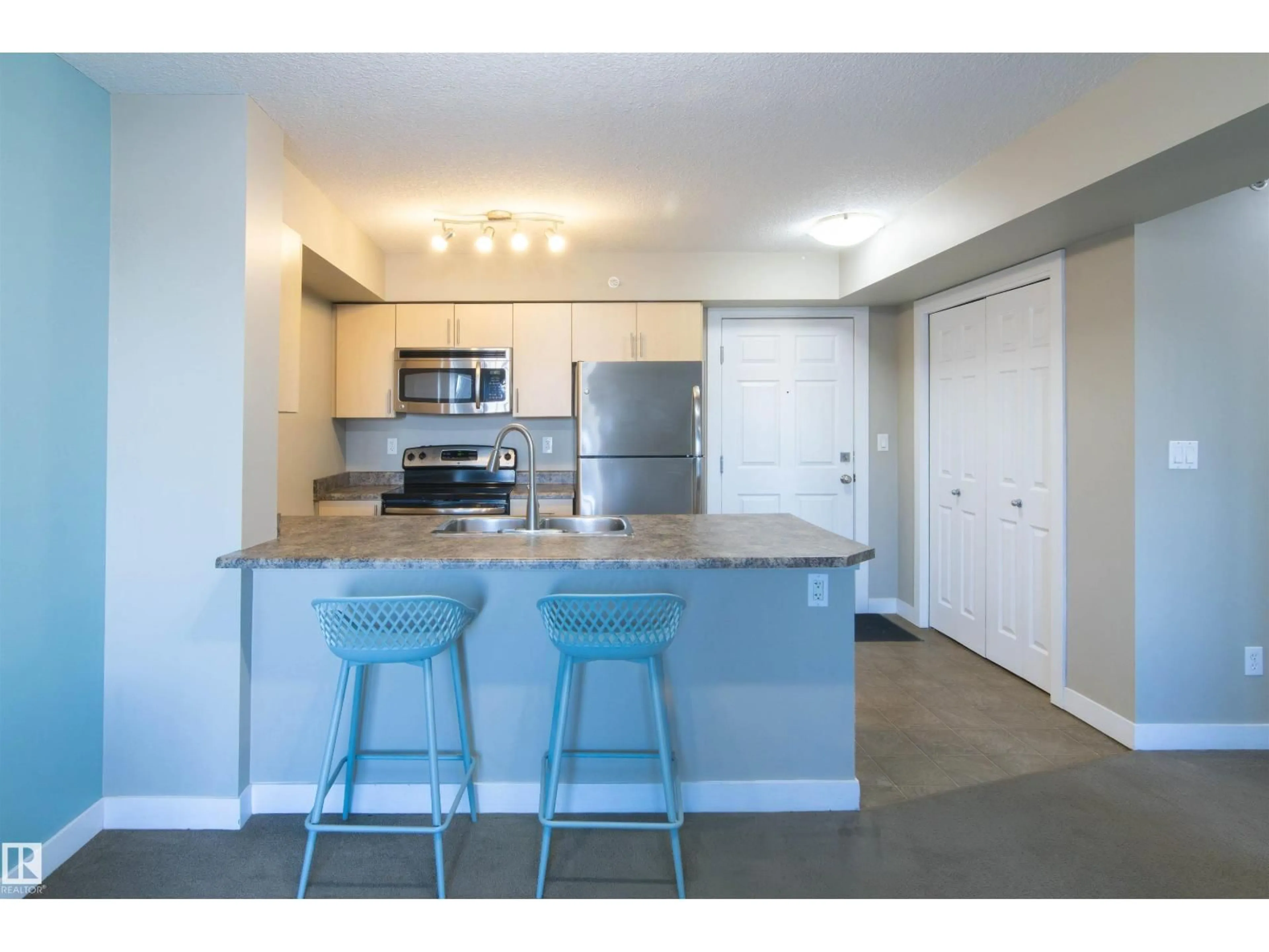 Open concept kitchen, unknown for 411 - 920 156 ST, Edmonton Alberta T6R0N6