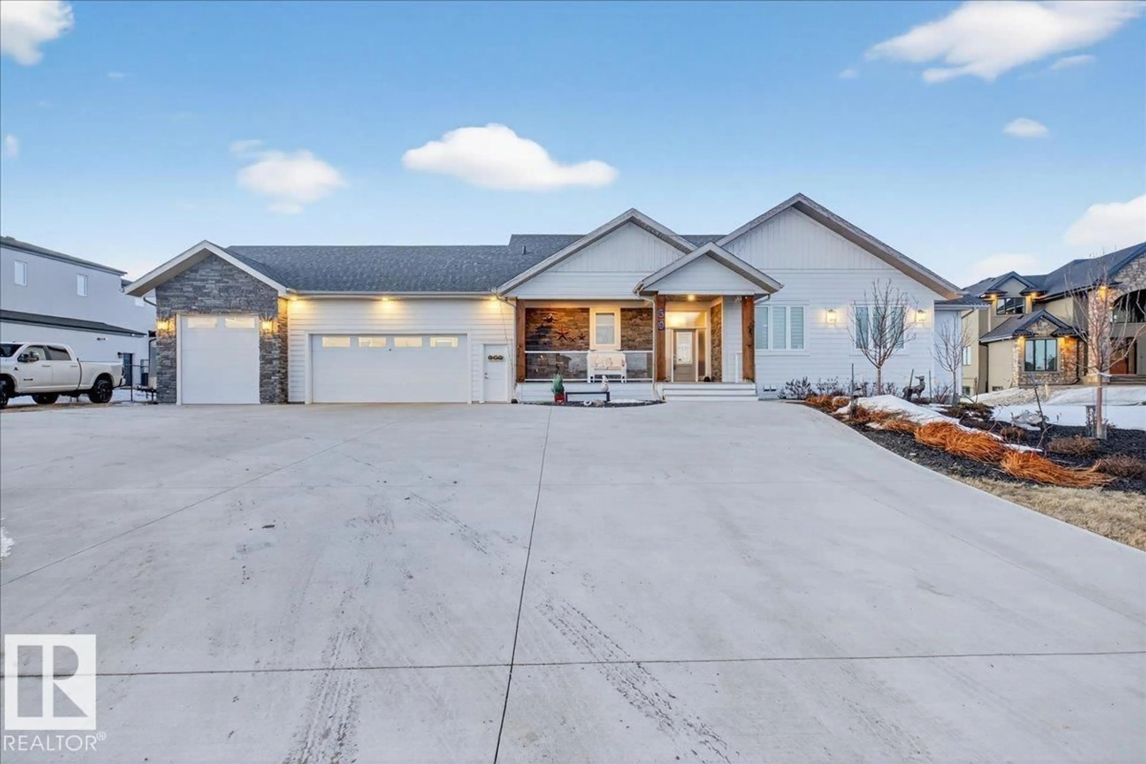 Home with vinyl exterior material, street for 59 26409 TWP ROAD 532 A, Rural Parkland County Alberta T7X0G3