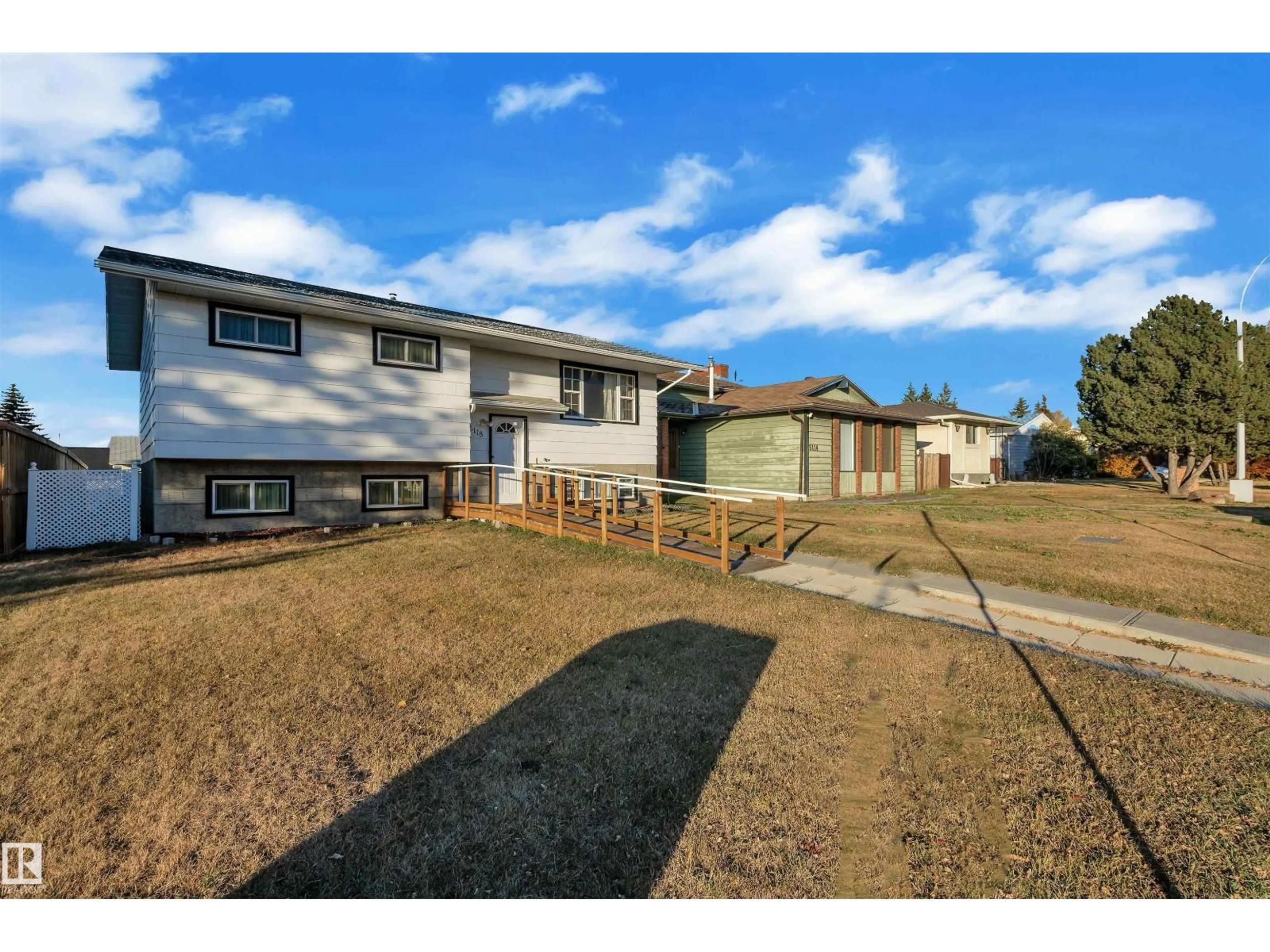 A pic from outside/outdoor area/front of a property/back of a property/a pic from drone, street for 5118 17A AV, Edmonton Alberta T6L1A6