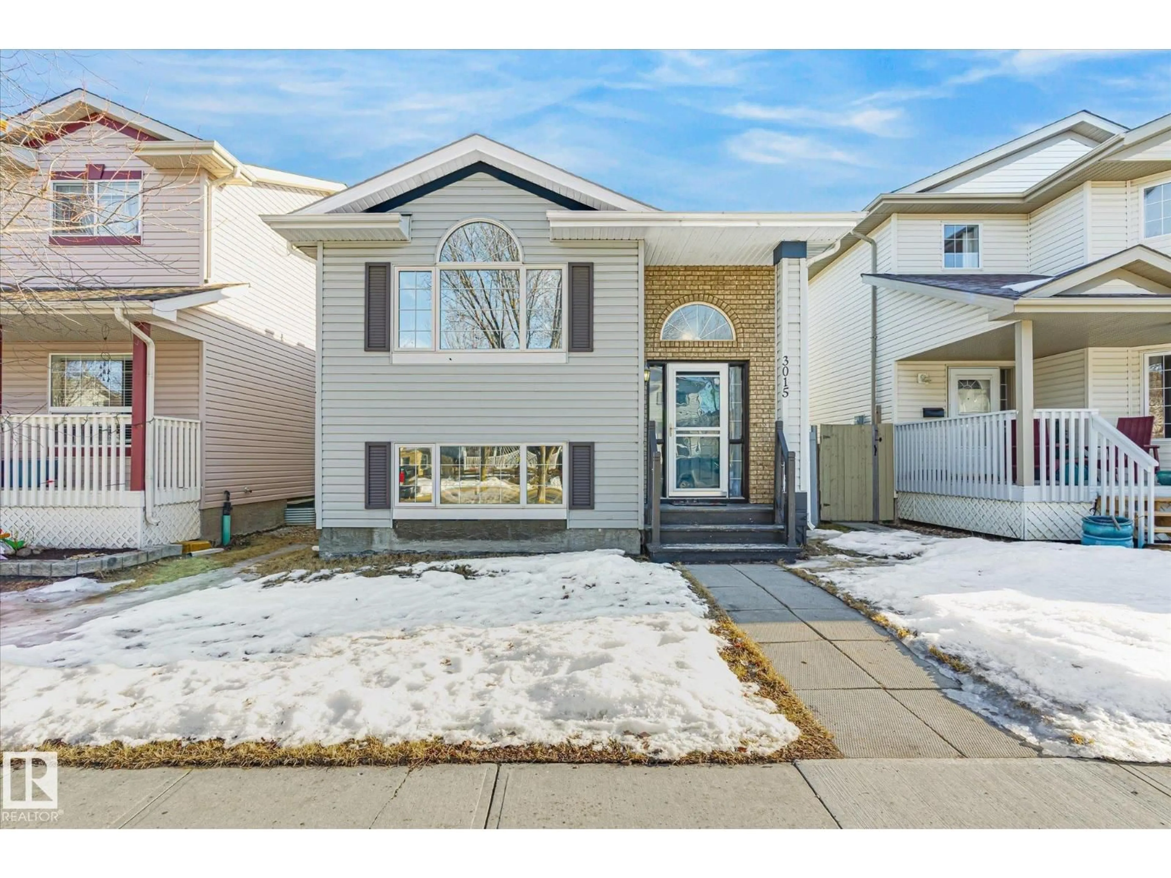 Home with vinyl exterior material, street for 3015 49, Beaumont Alberta T4X1S6