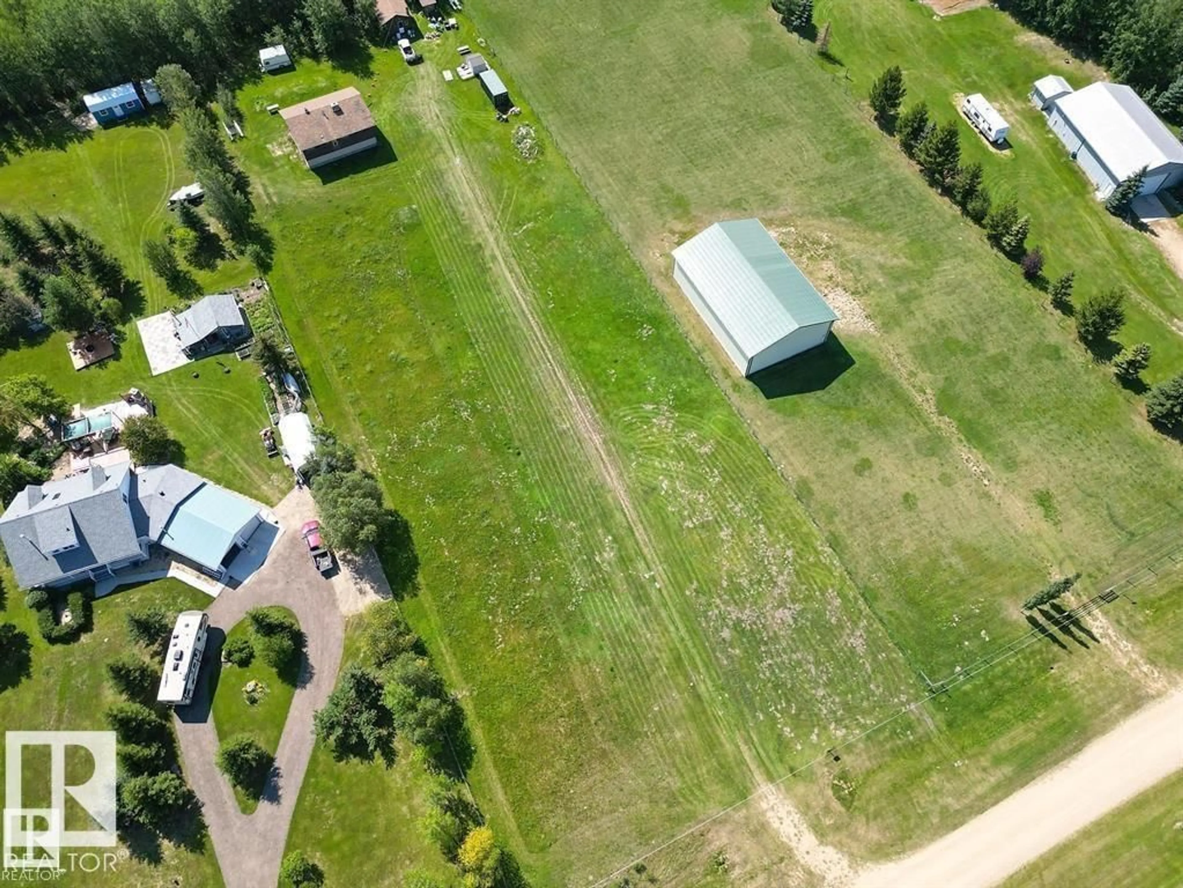 A pic from outside/outdoor area/front of a property/back of a property/a pic from drone, unknown for 45A RGE ROAD 11, Rural Wetaskiwin County Alberta T0C2P0