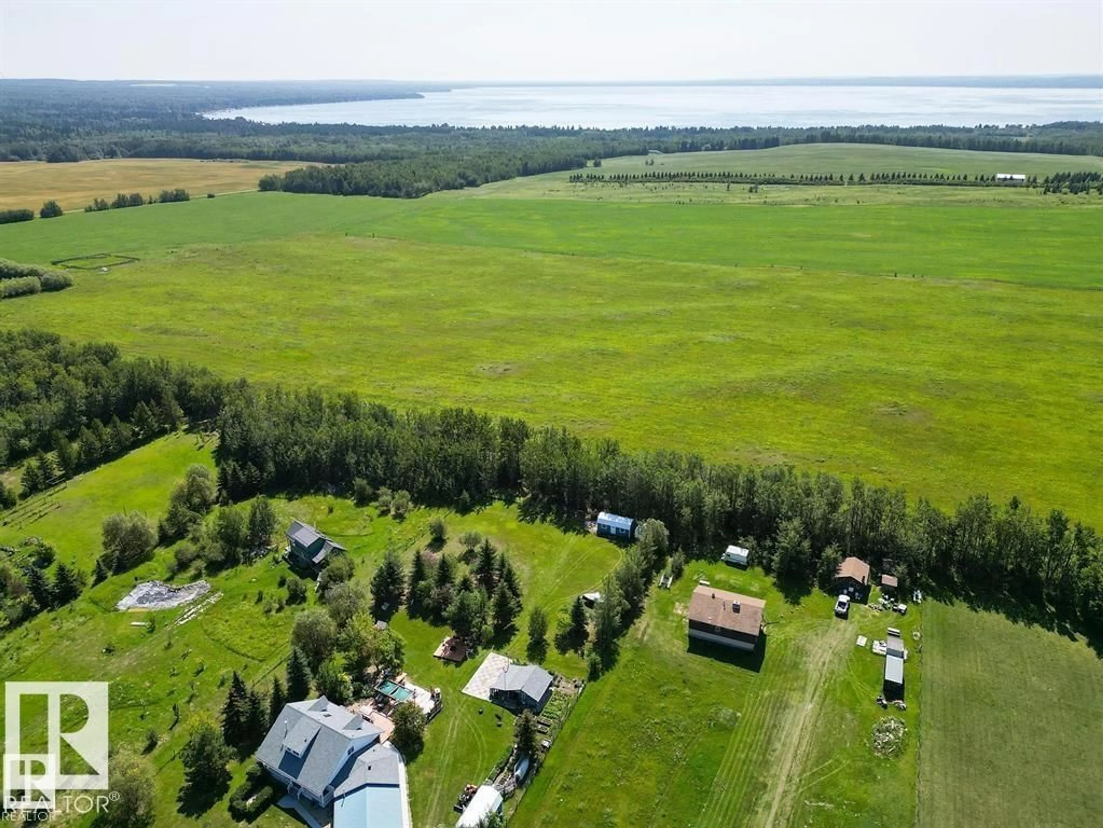 A pic from outside/outdoor area/front of a property/back of a property/a pic from drone, water/lake/river/ocean view for 45A RGE ROAD 11, Rural Wetaskiwin County Alberta T0C2P0