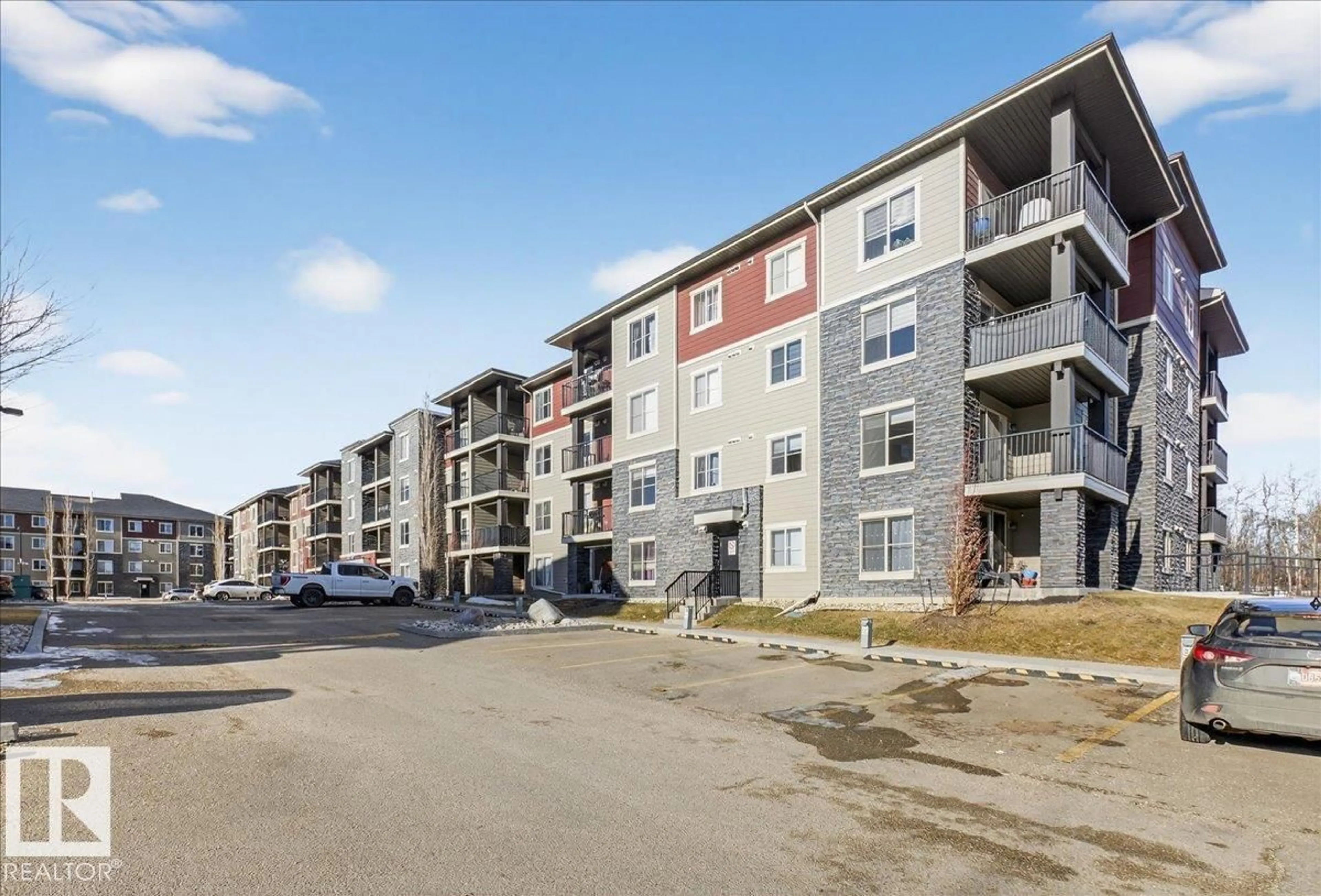 A pic from outside/outdoor area/front of a property/back of a property/a pic from drone, street for 213 - 1070 MCCONACHIE BV, Edmonton Alberta T5Y0X1