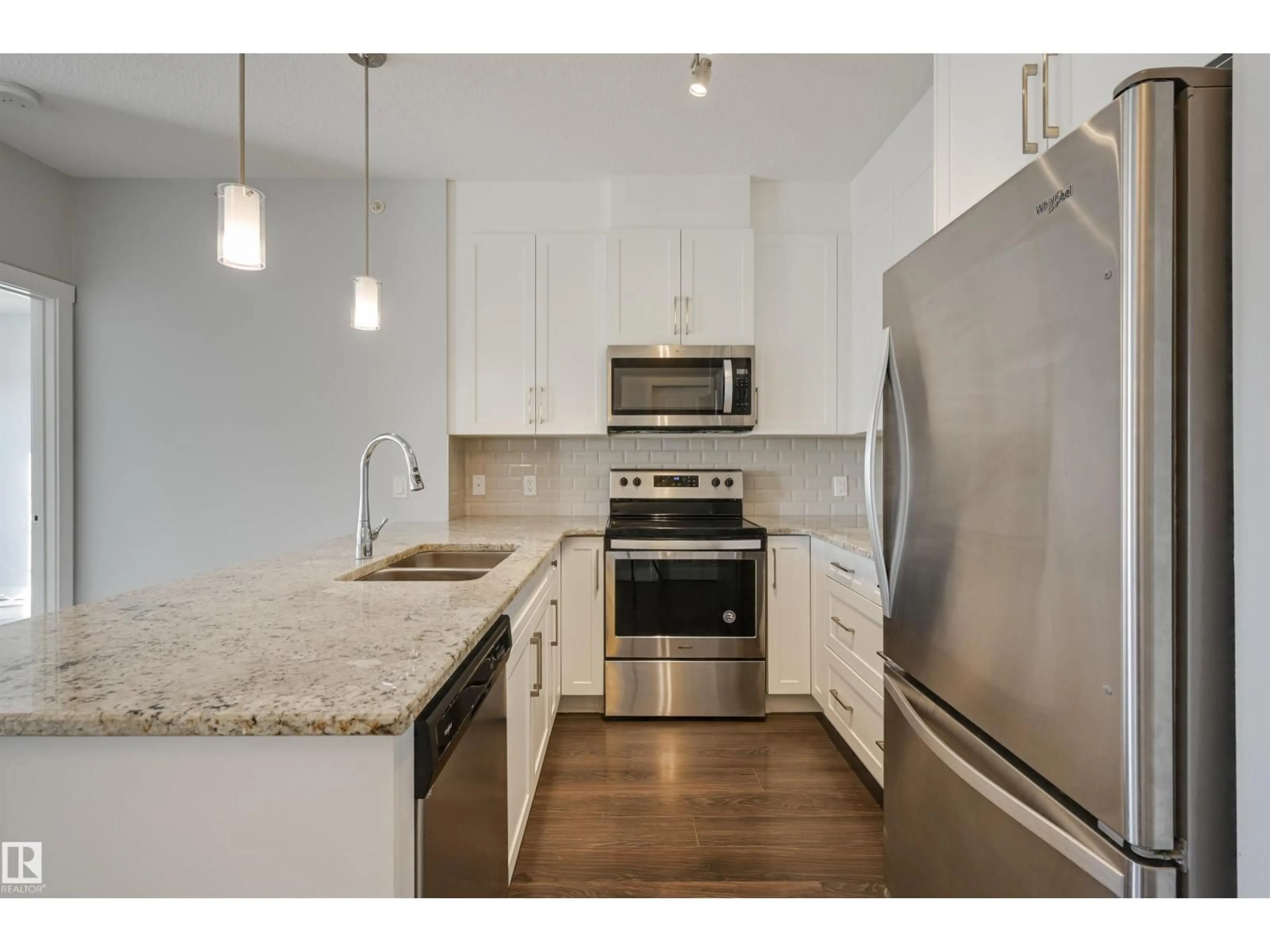 Open concept kitchen, unknown for 411 - 3670 139 AV, Edmonton Alberta T5Y3N5