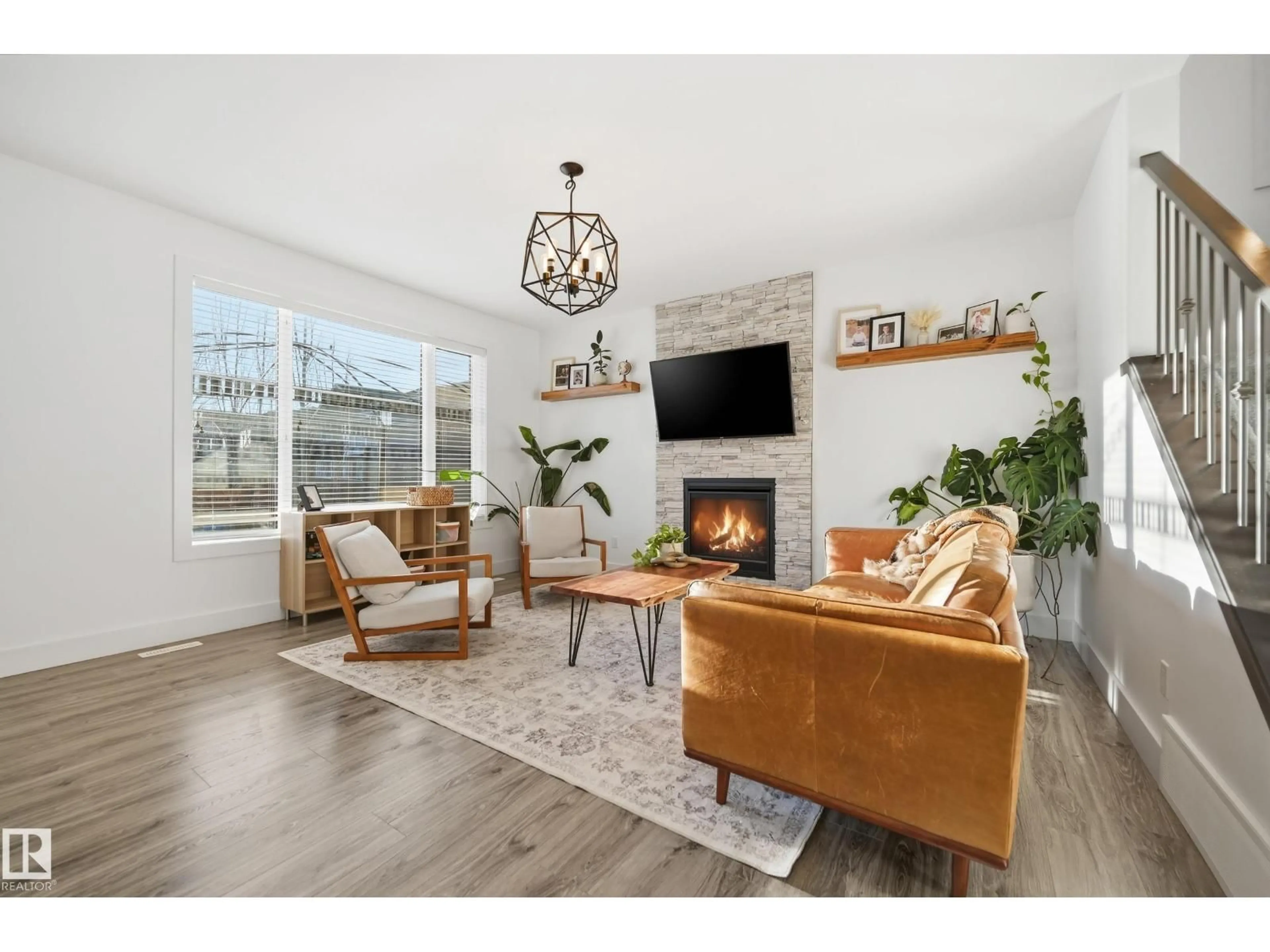 Living room with furniture, wood/laminate floor for 30 WILLOW LI, Fort Saskatchewan Alberta T8L0L5