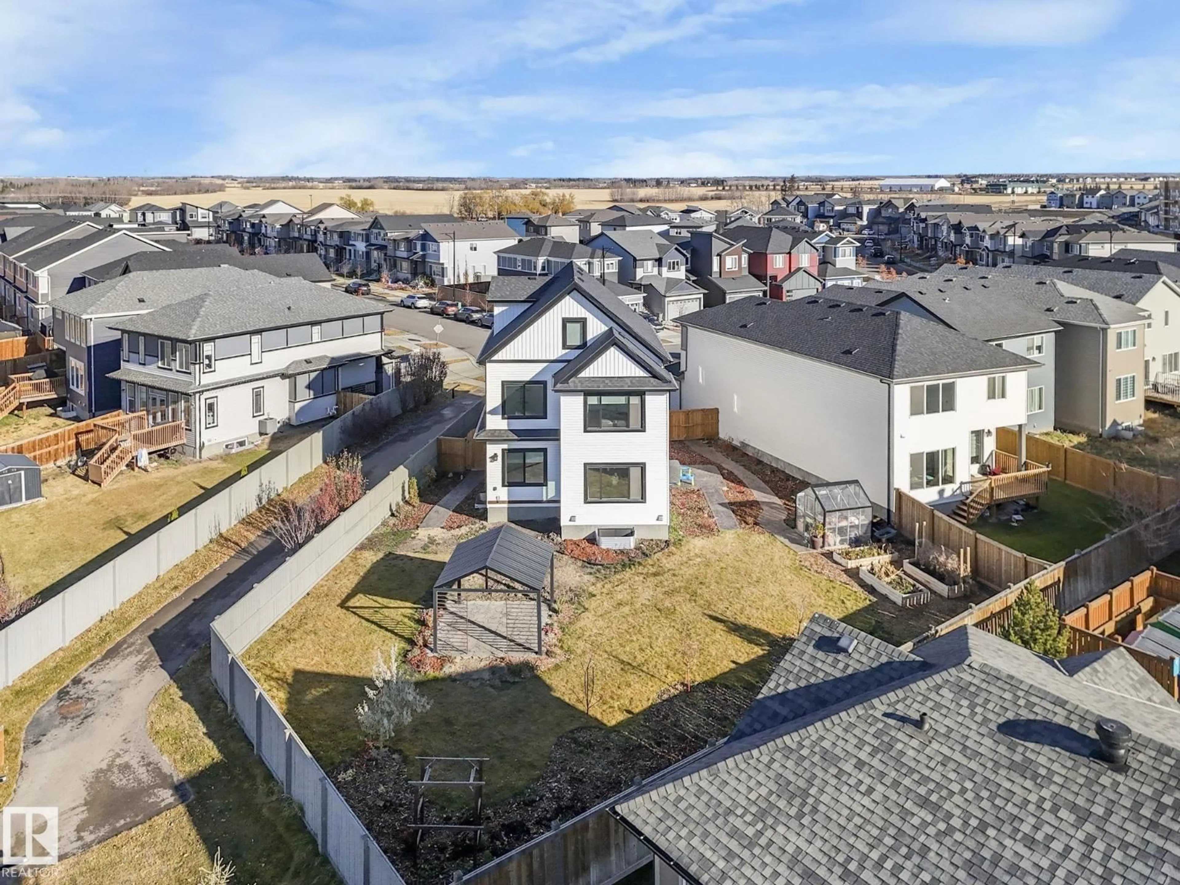 A pic from outside/outdoor area/front of a property/back of a property/a pic from drone, unknown for 6613 62 AV, Beaumont Alberta T4X0J3