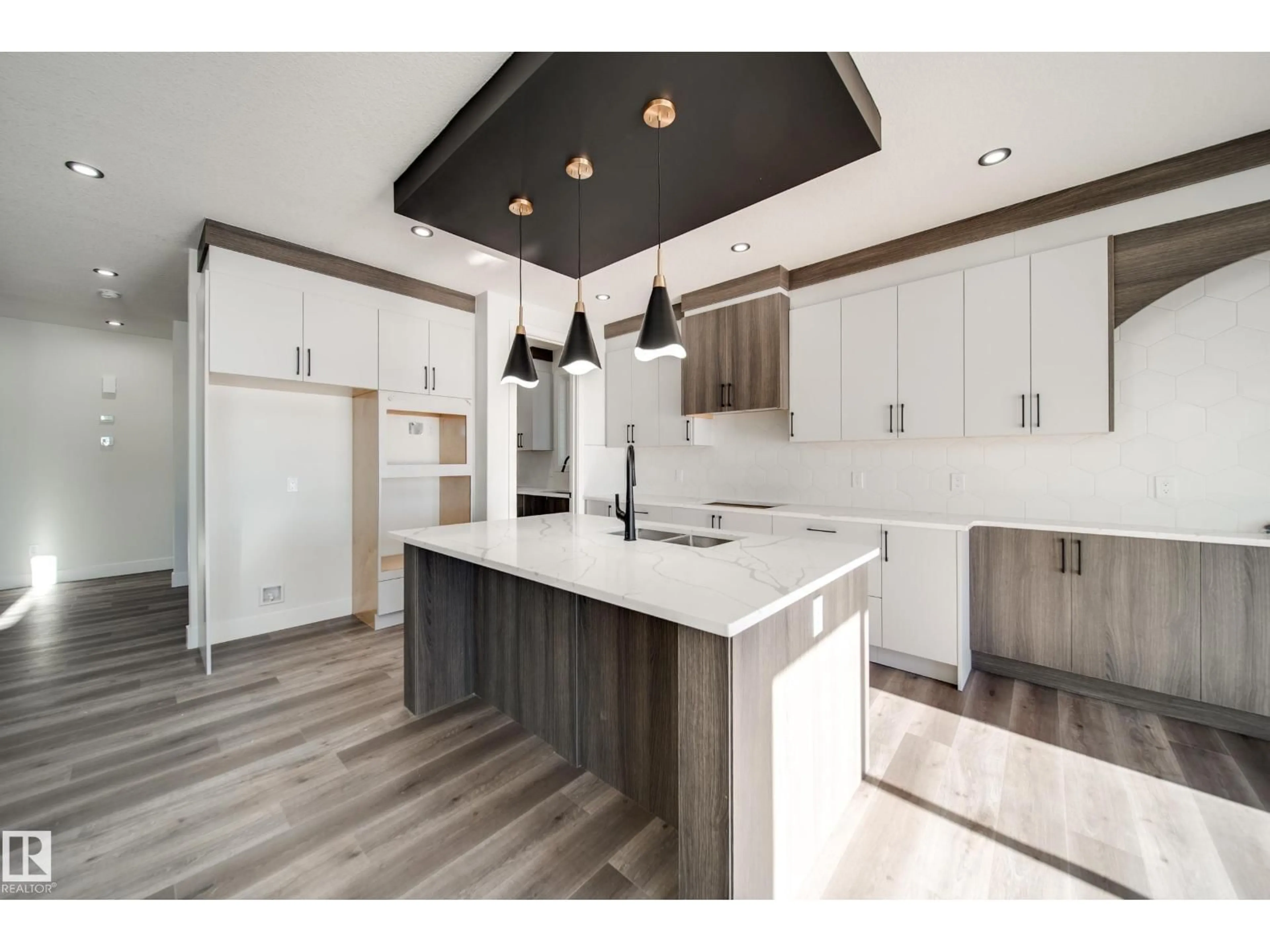 Open concept kitchen, wood/laminate floor for NW - 7023 177 AV, Edmonton Alberta T5Z0W9
