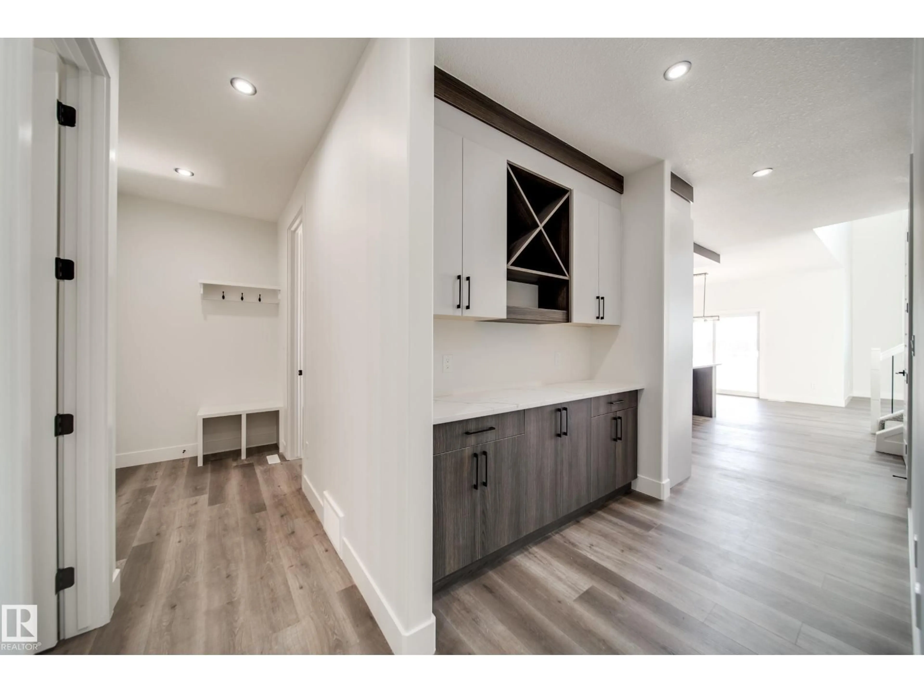 Open concept kitchen, wood/laminate floor for NW - 7023 177 AV, Edmonton Alberta T5Z0W9