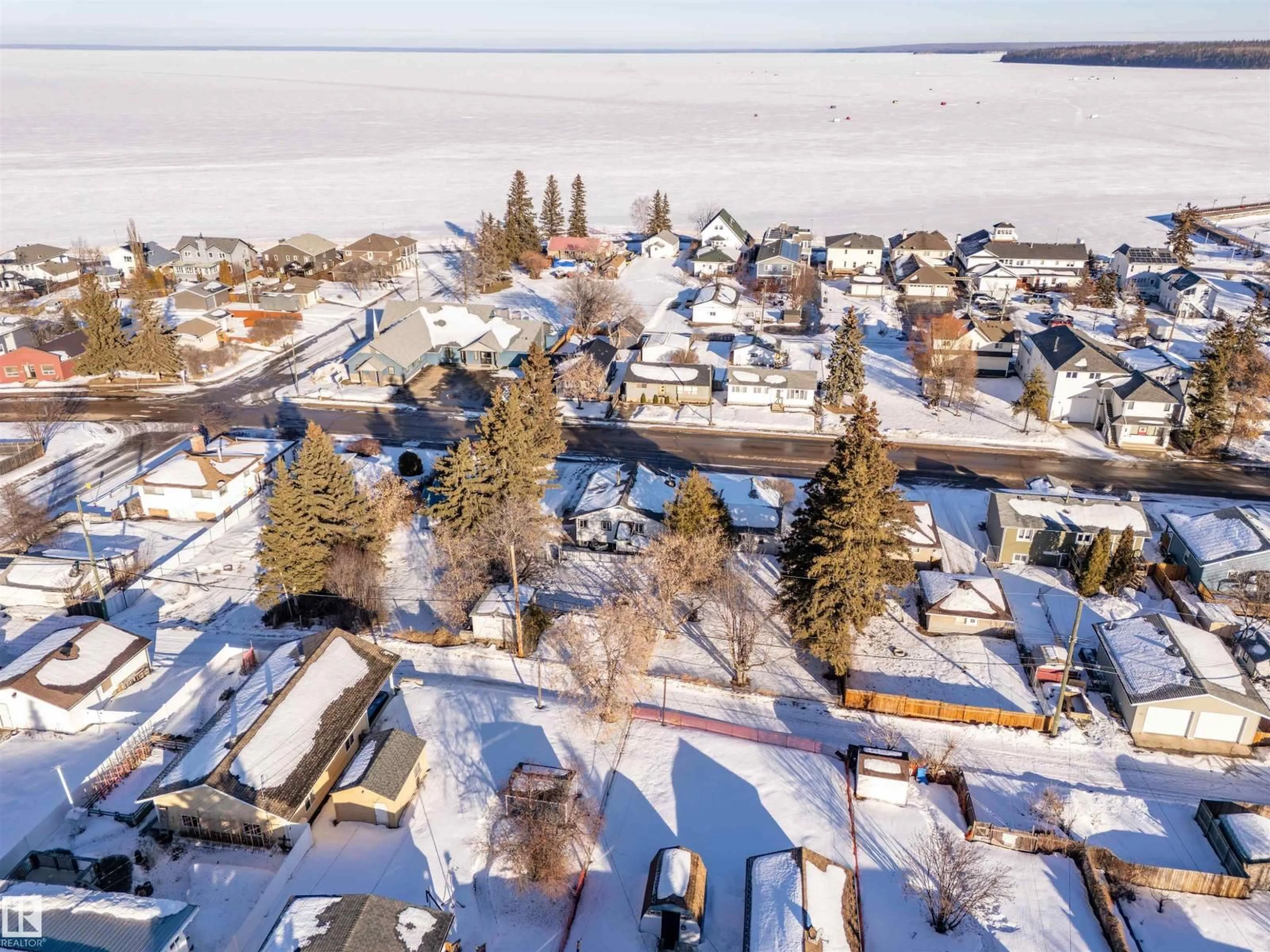 A pic from outside/outdoor area/front of a property/back of a property/a pic from drone, water/lake/river/ocean view for 607 10 ST, Cold Lake Alberta T9M1A9