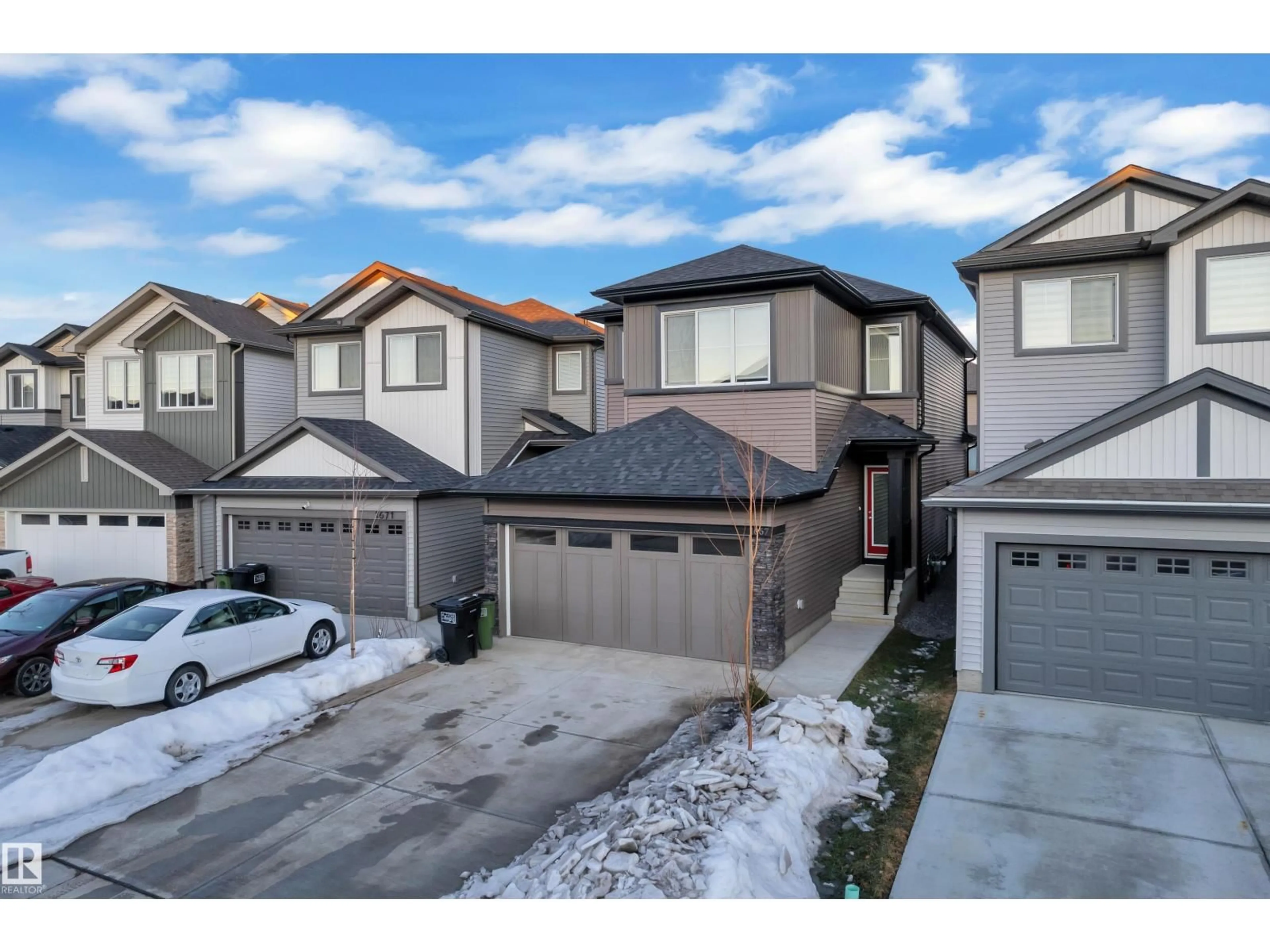 A pic from outside/outdoor area/front of a property/back of a property/a pic from drone, street for 1667 13 ST, Edmonton Alberta T6T2N5