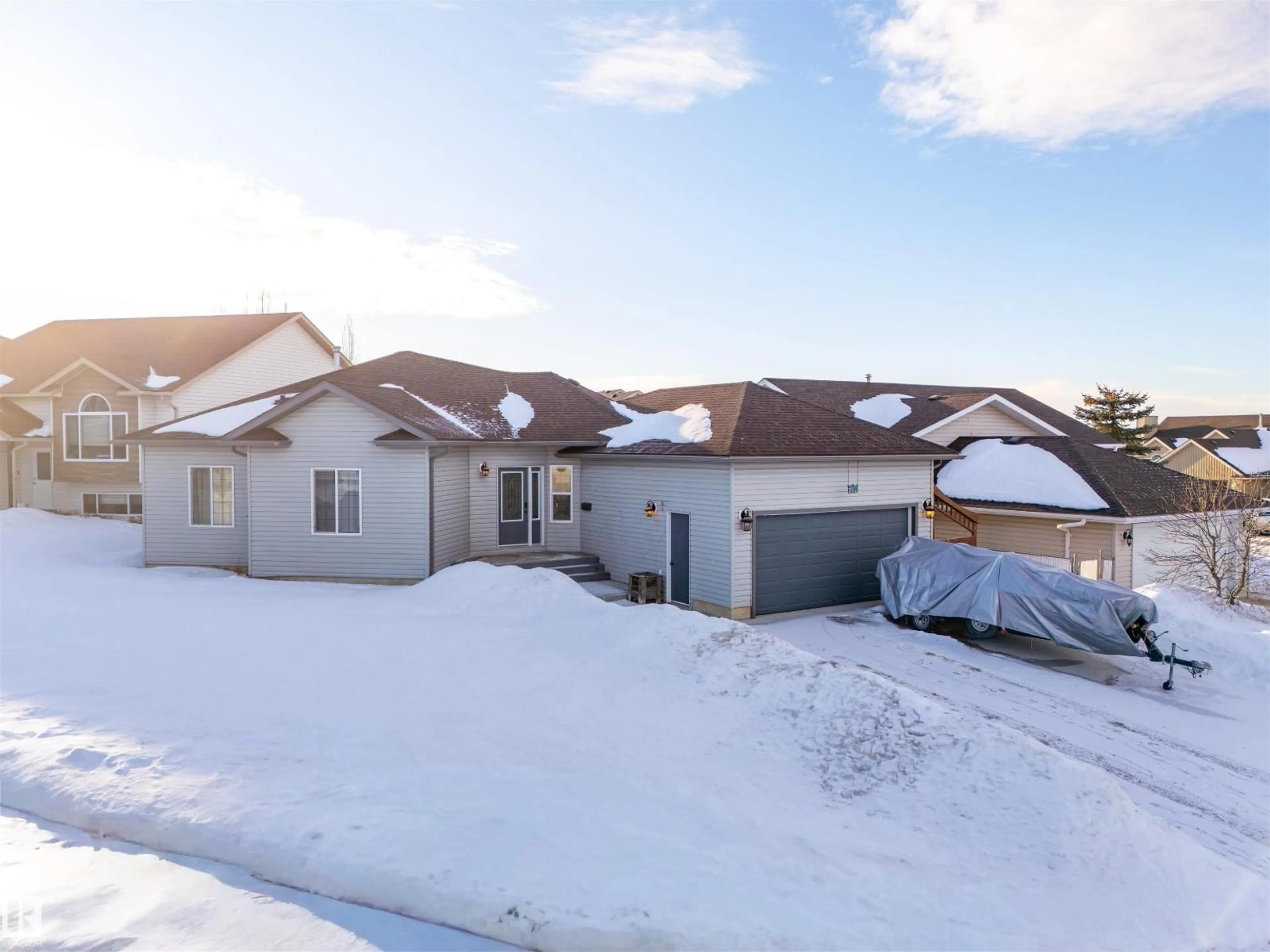 A pic from outside/outdoor area/front of a property/back of a property/a pic from drone, street for 701 SPARROW CL, Cold Lake Alberta T9M2B7