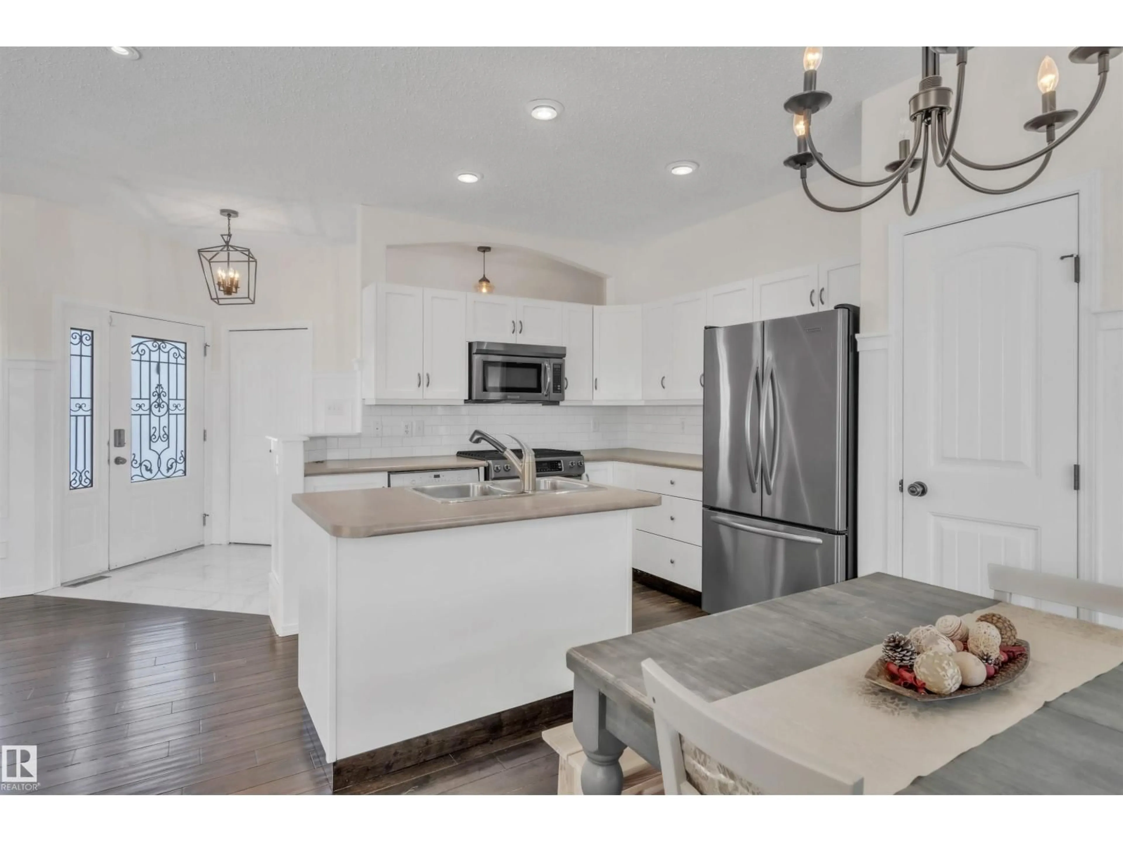 Open concept kitchen, ceramic/tile floor for 701 SPARROW CL, Cold Lake Alberta T9M2B7