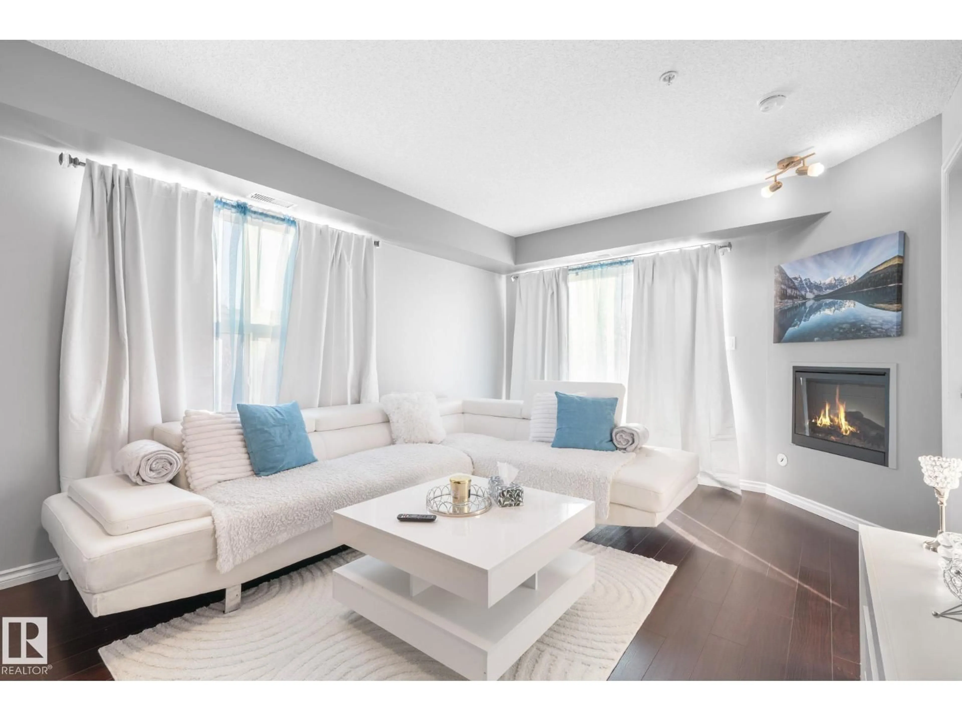 Living room with furniture, wood/laminate floor for #301 - 10118 106 AV, Edmonton Alberta T5H0B8