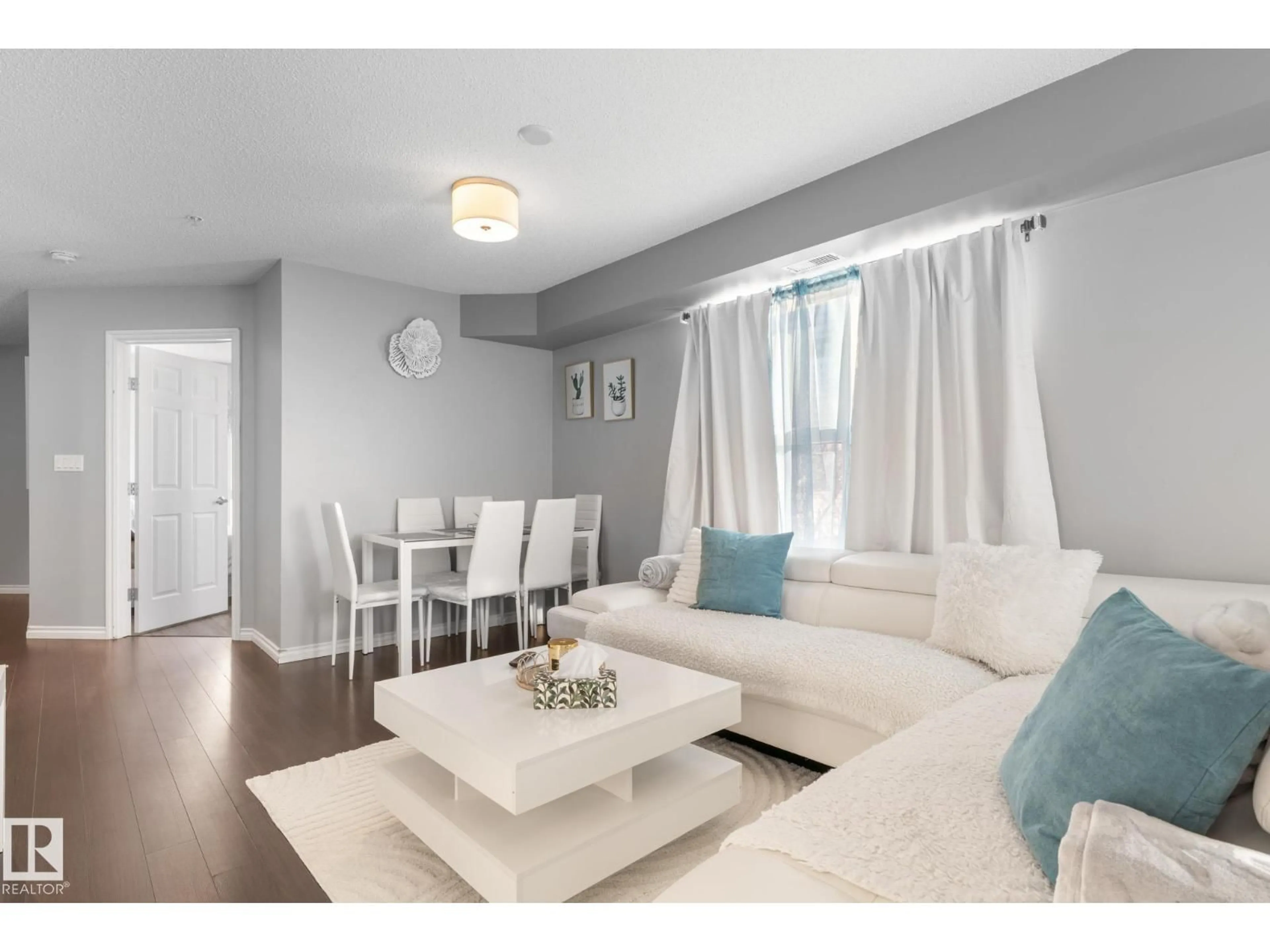 Living room with furniture, wood/laminate floor for #301 - 10118 106 AV, Edmonton Alberta T5H0B8