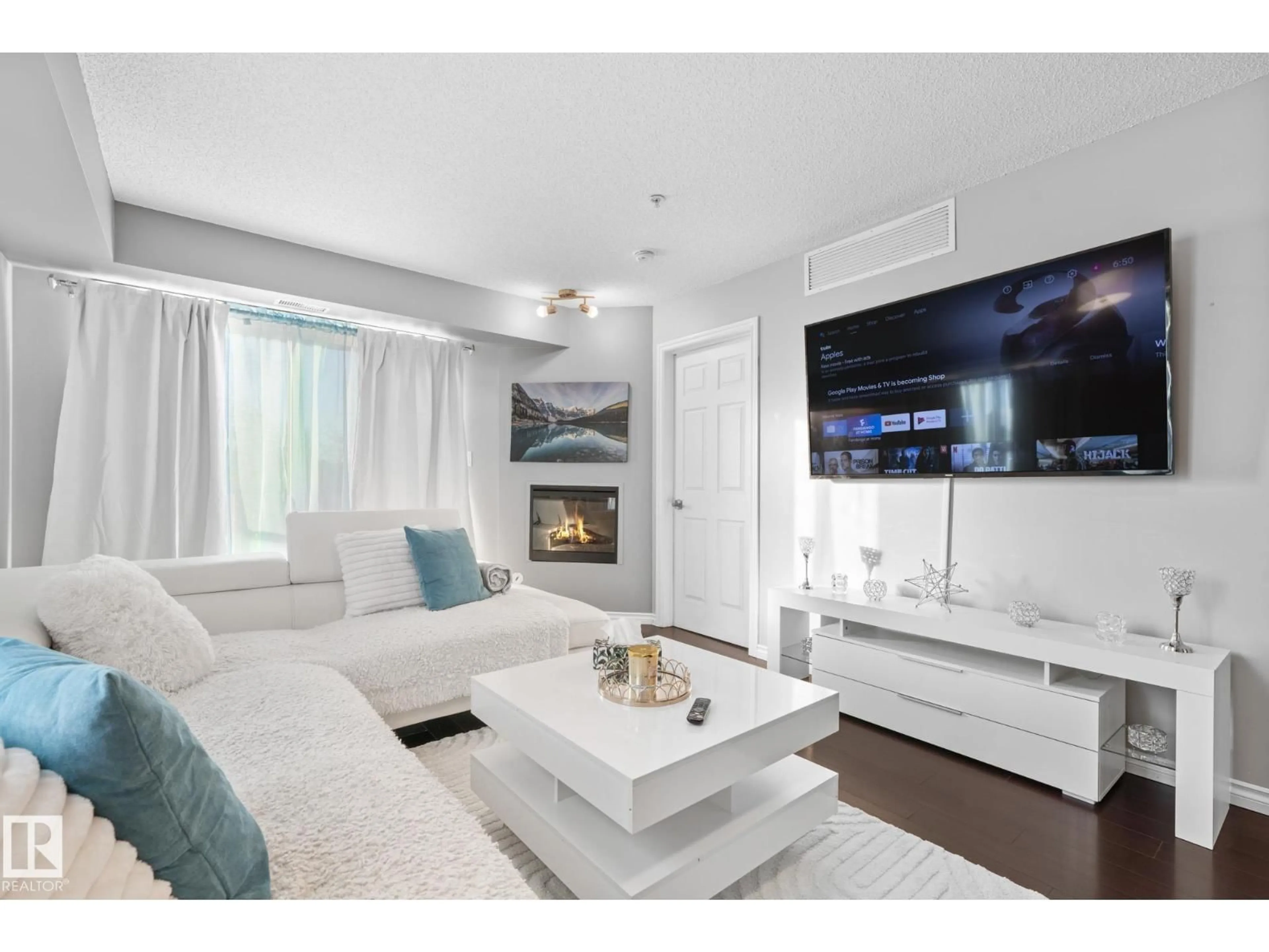 Living room with furniture, wood/laminate floor for #301 - 10118 106 AV, Edmonton Alberta T5H0B8