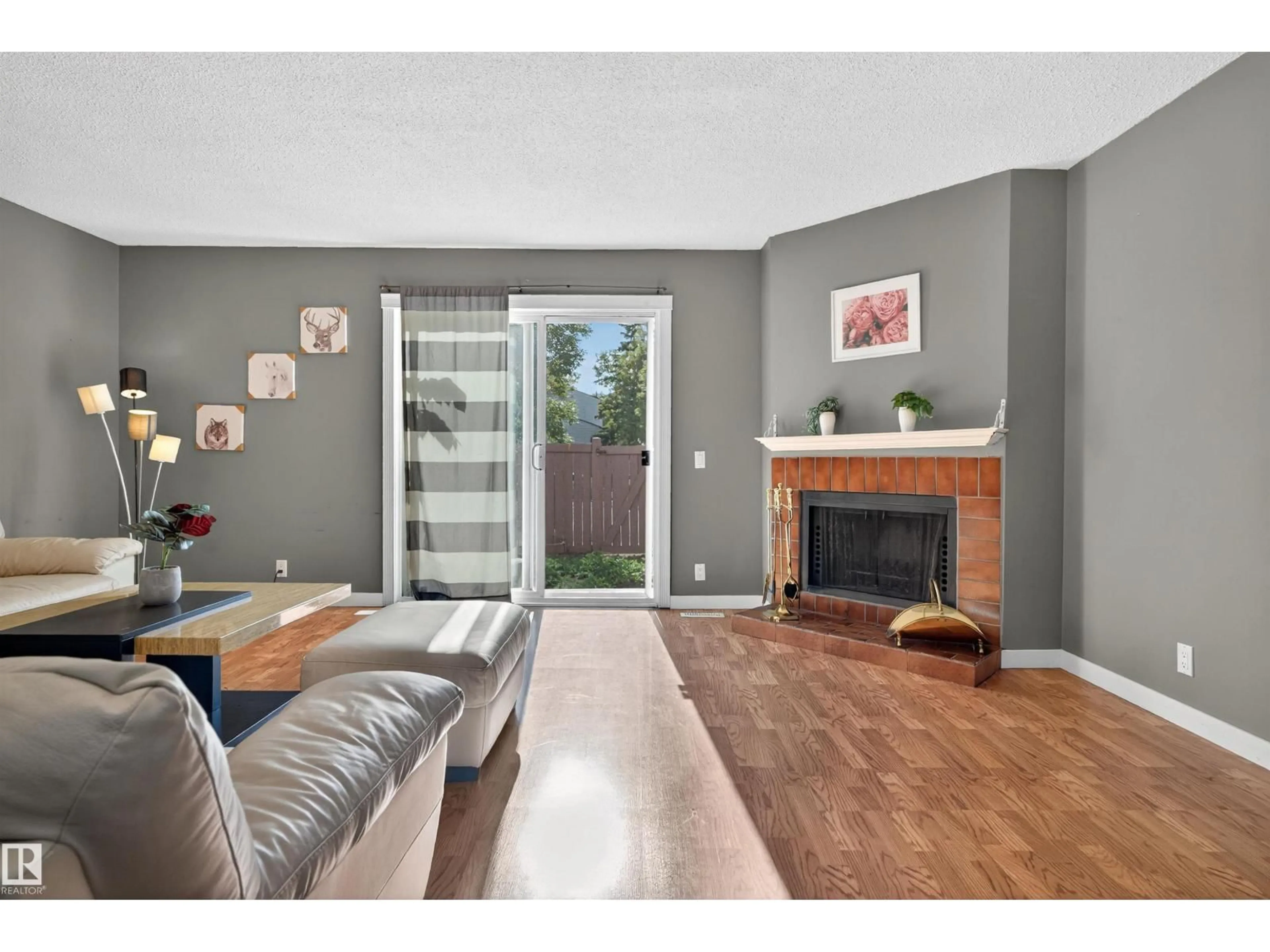 Living room with furniture, unknown for 14017 121 ST, Edmonton Alberta T5X4H8