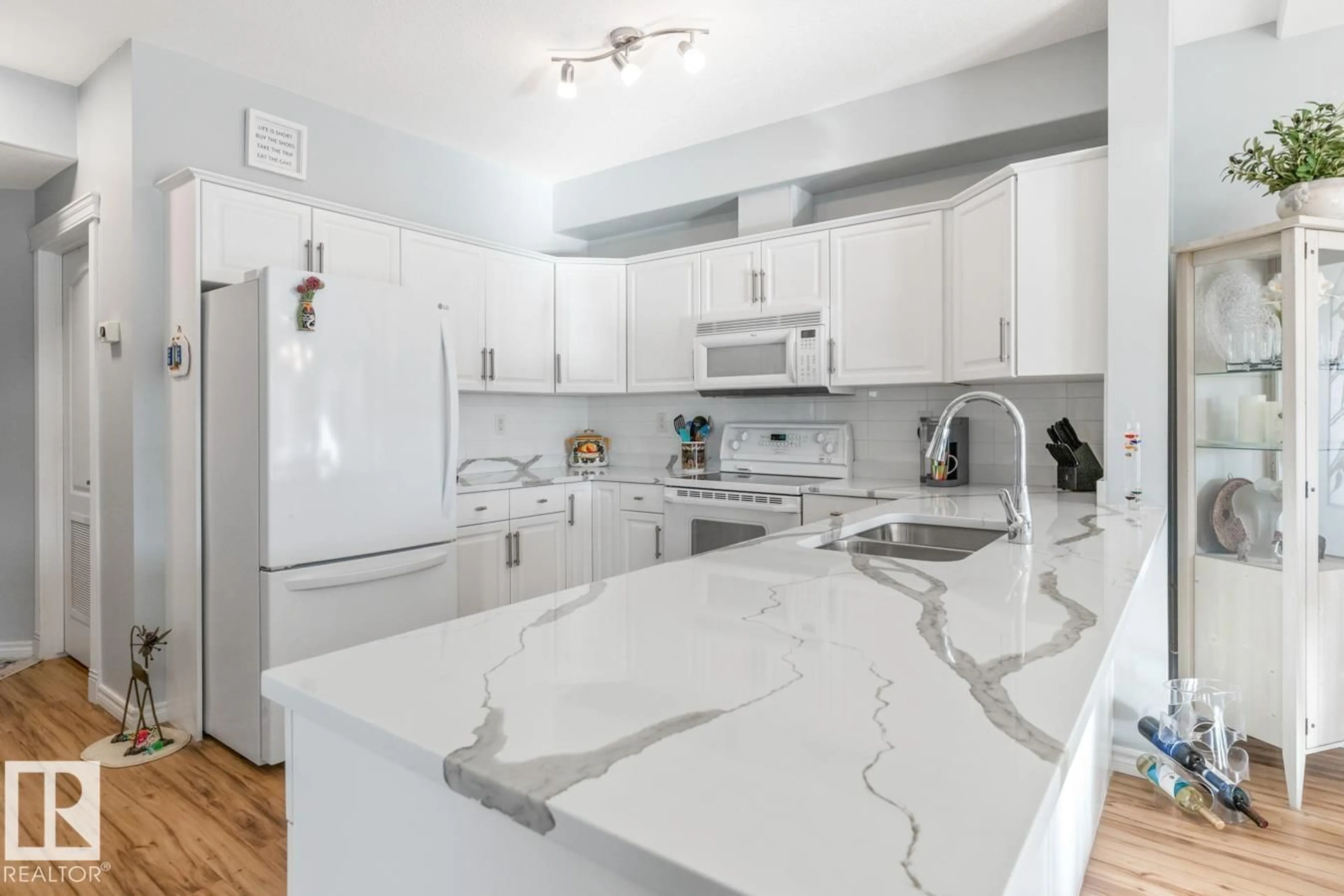 Open concept kitchen, ceramic/tile floor for 259 - 2750 55 ST NW, Edmonton Alberta T6L7H5