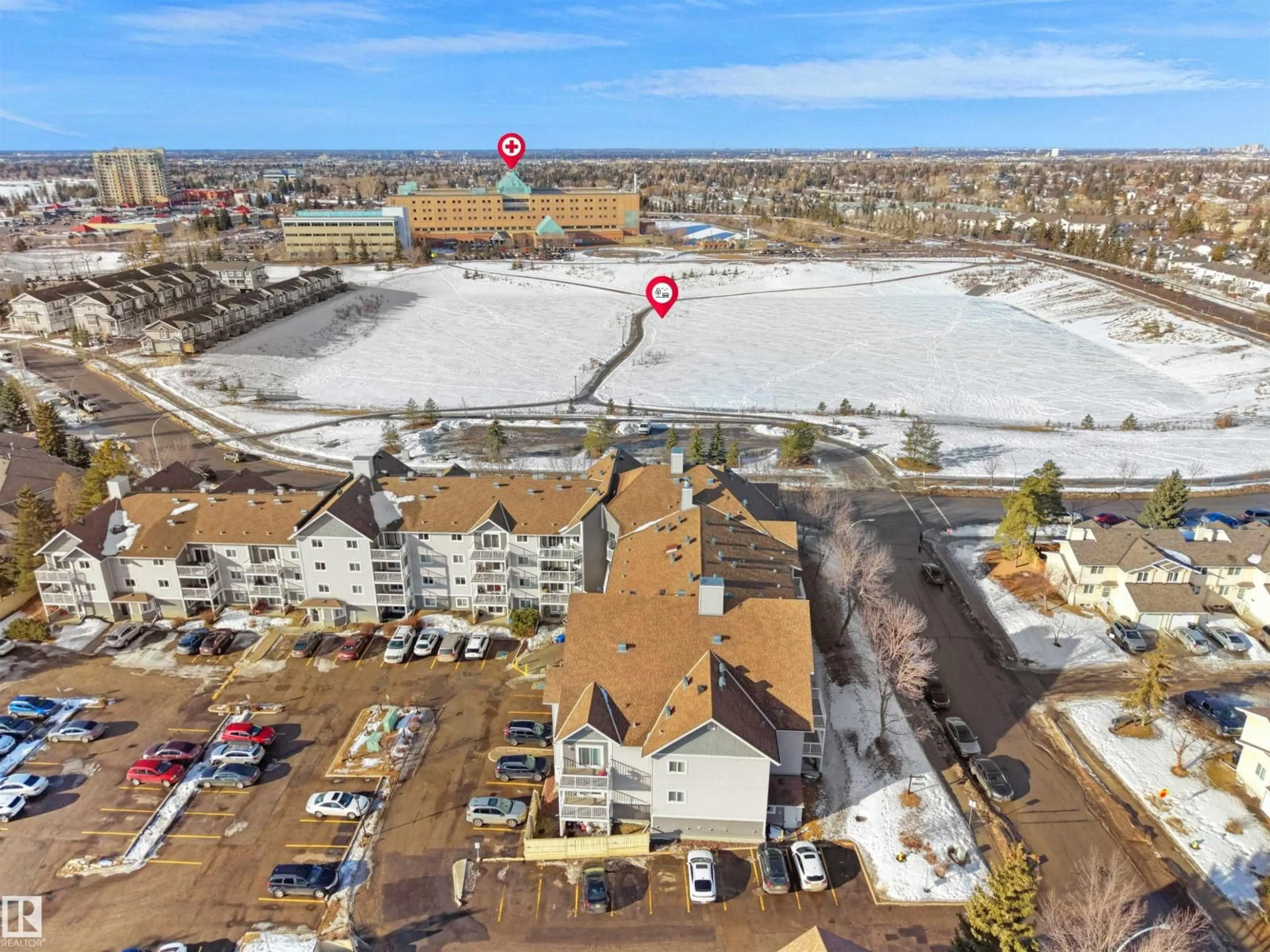 A pic from outside/outdoor area/front of a property/back of a property/a pic from drone, street for #108 - 5065 31 AV NW, Edmonton Alberta T6L6S5