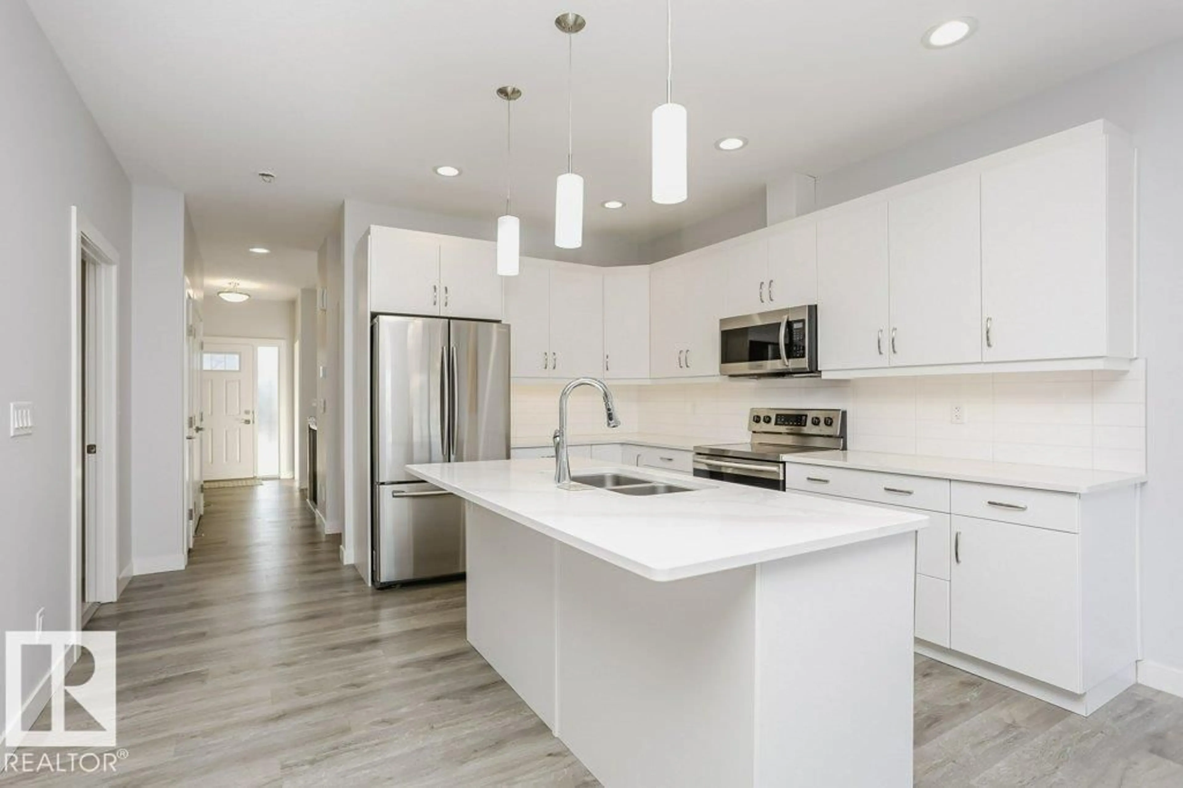 Open concept kitchen, unknown for #33 - 4517 190A ST, Edmonton Alberta T6M0R4